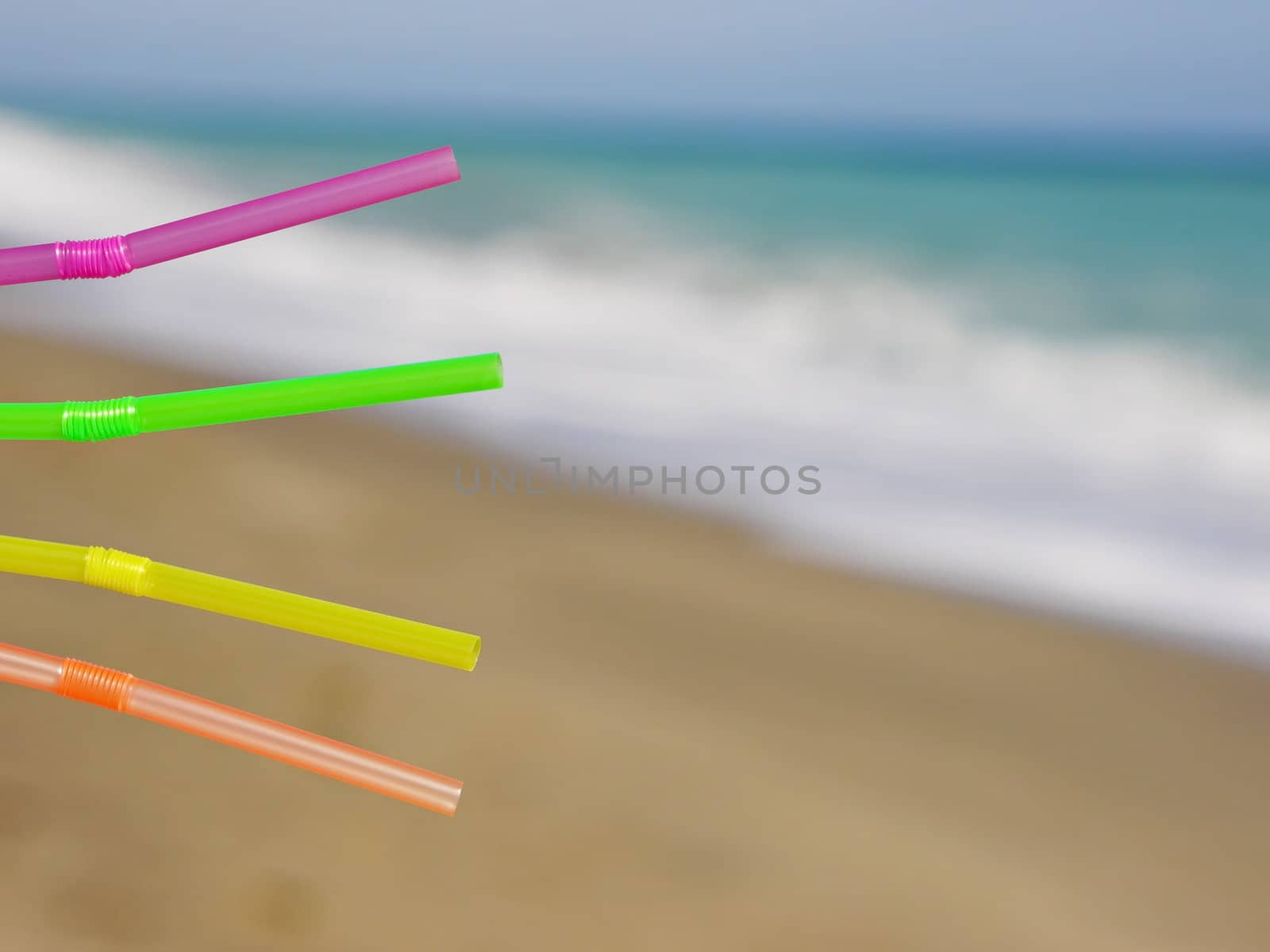 drinking straws beach drink outside at ocean