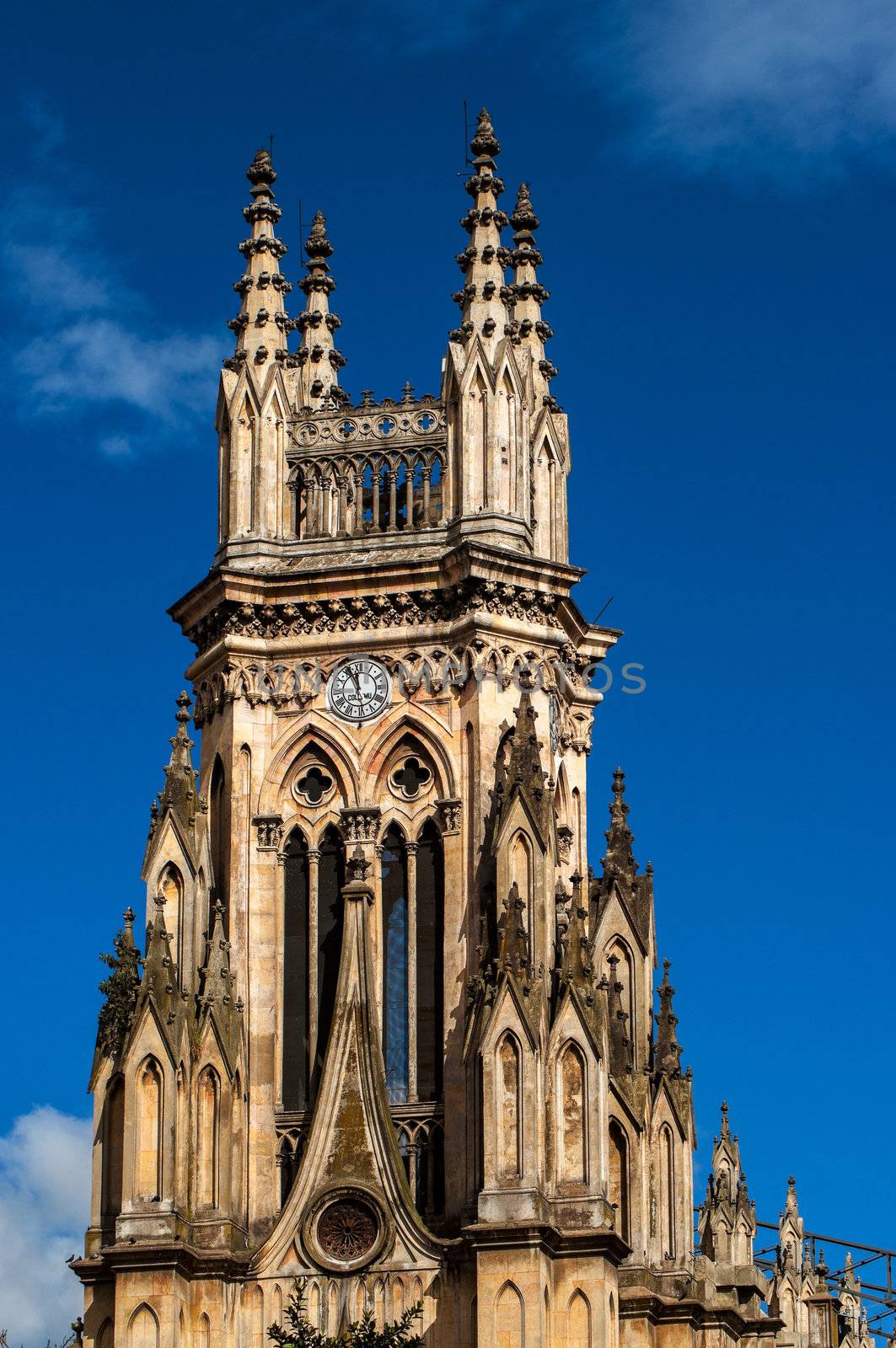 Tower of Loudes church with blue sky in Bogota, Colombia