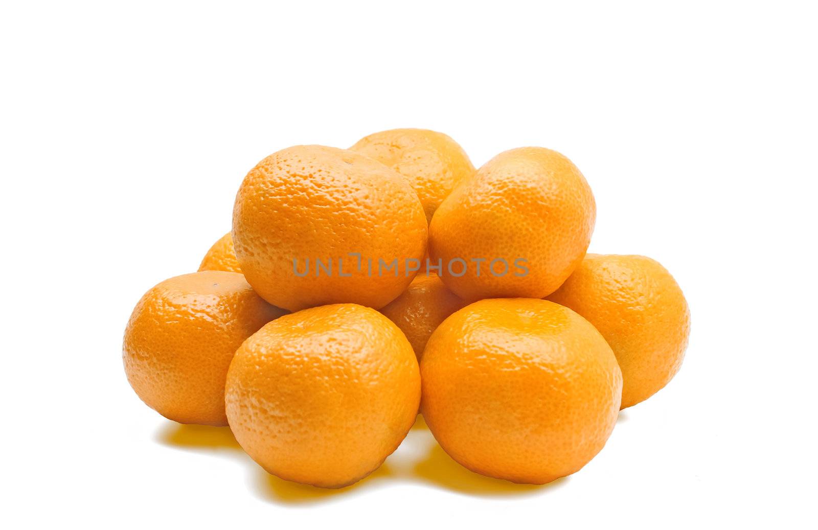 Several whole tangerine on a white background