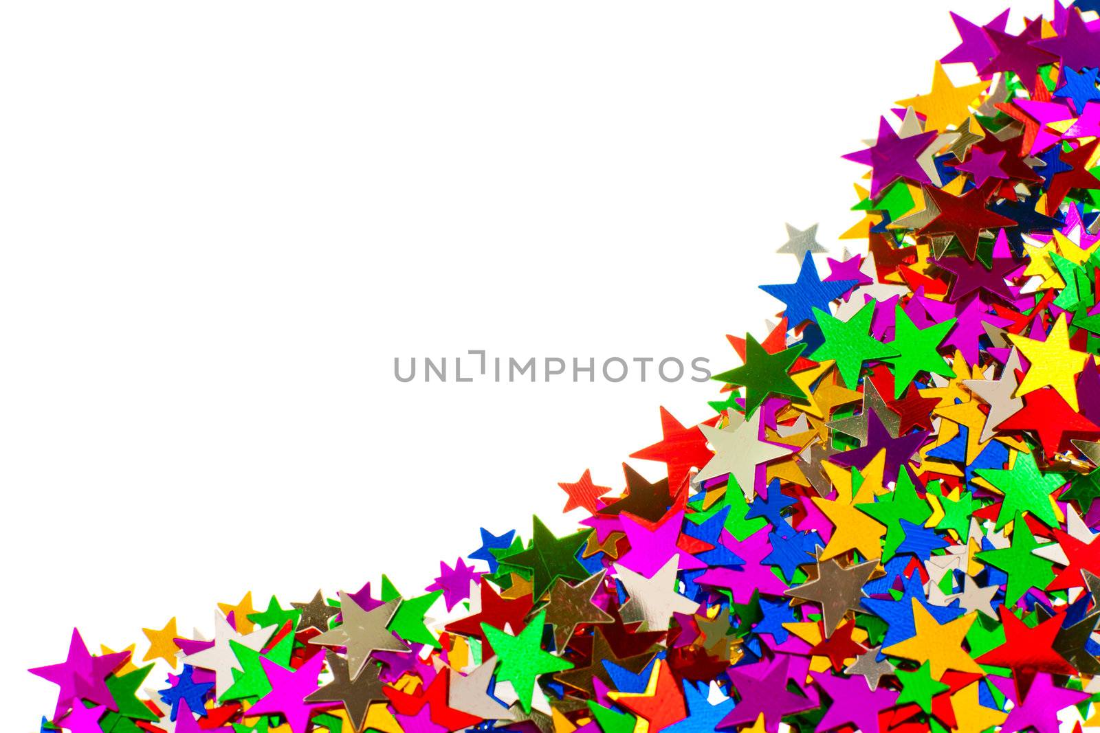 Colorful star shaped confetti on white background