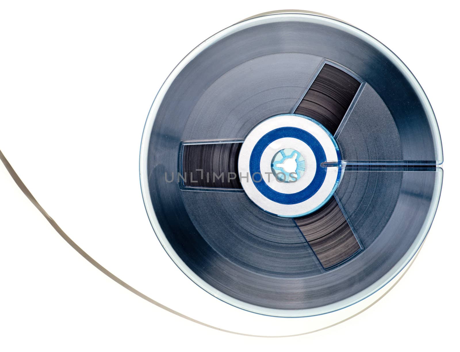 Vintage reel of audio tape on white background