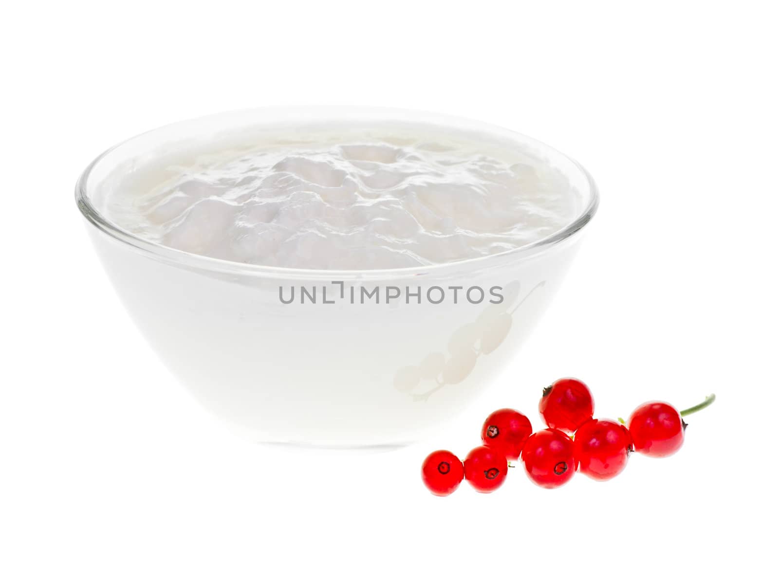 Yogurt bowl with Redcurrant berries on white background