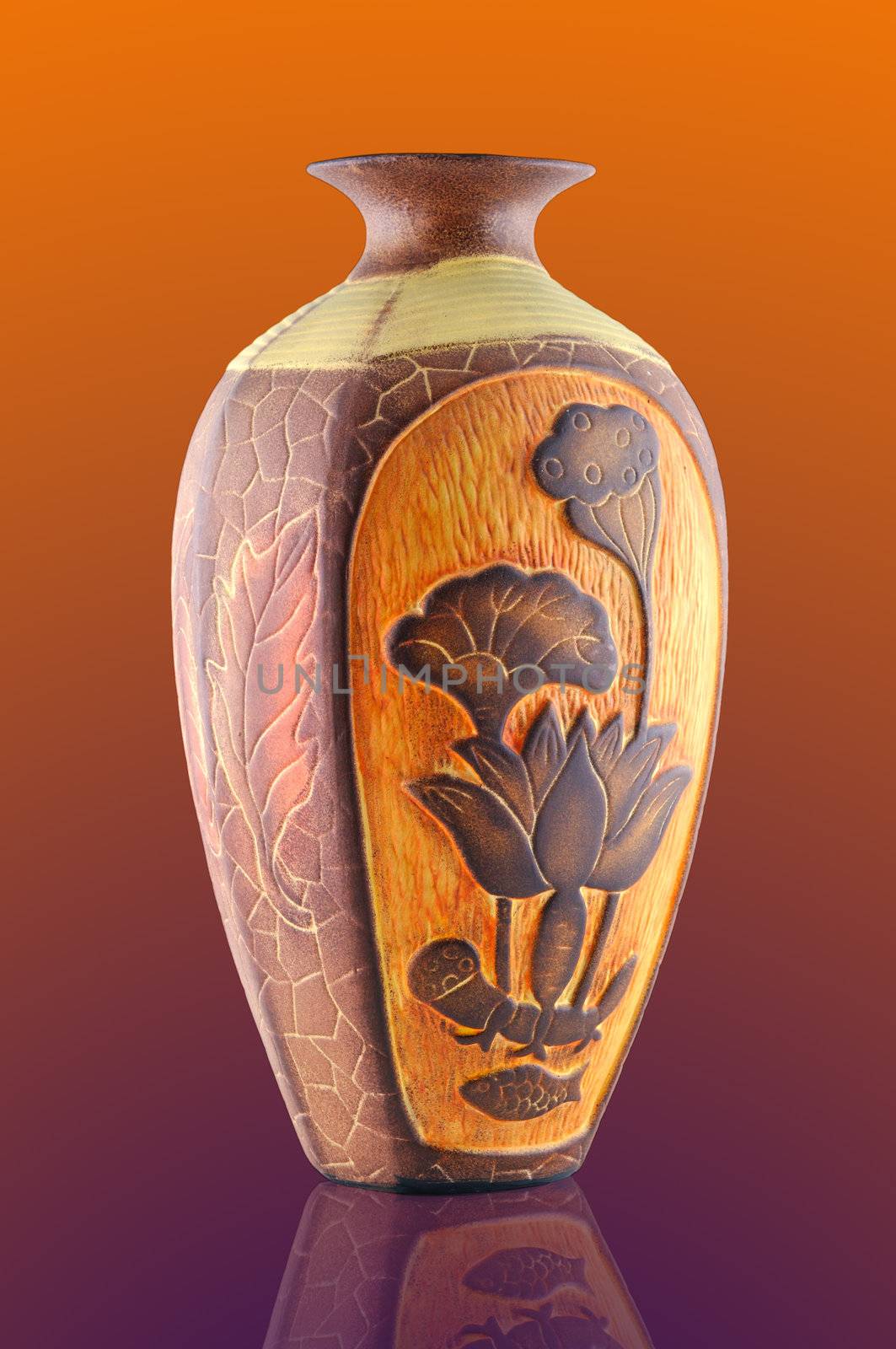 Highly decorative ceramic flower vase decorated with a beautiful, against a white background