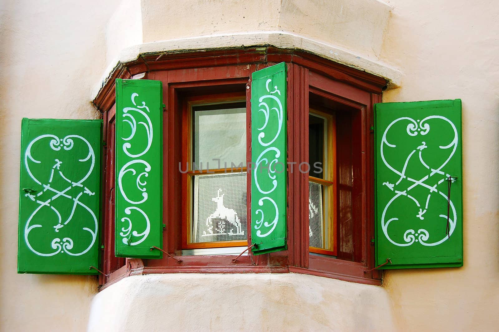 Detail of a typical window with decorations in Engadine - Switzerland
