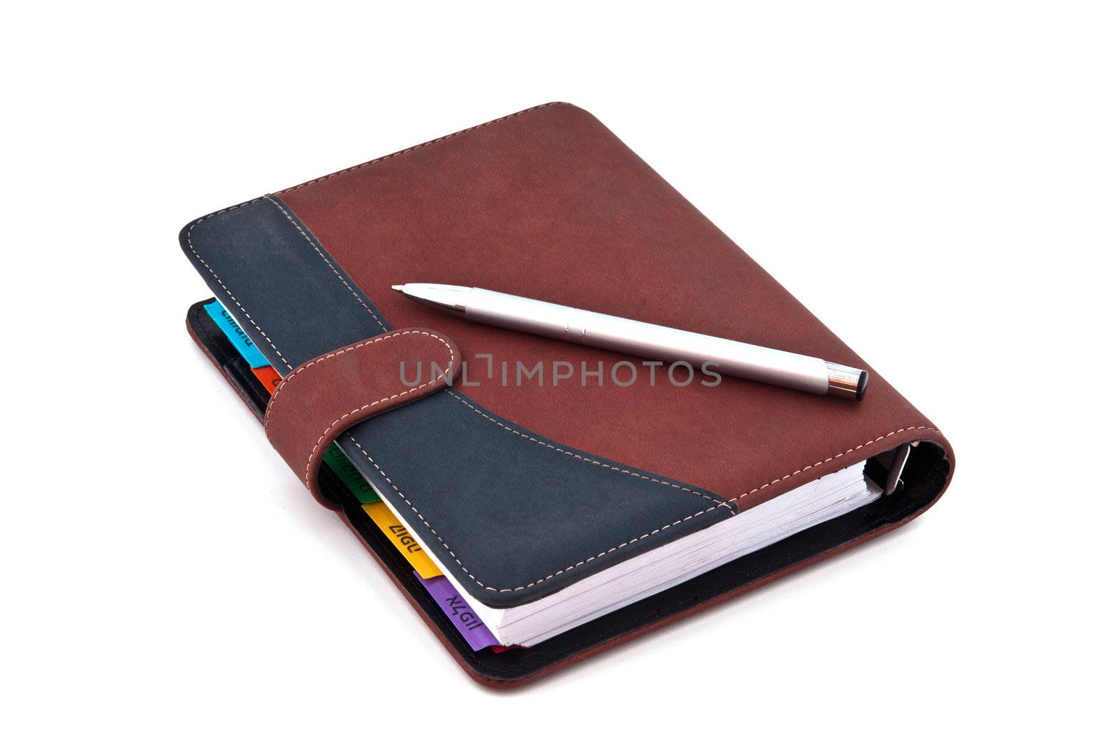 Diary of a brown color with a soft cover, photographed against a white background