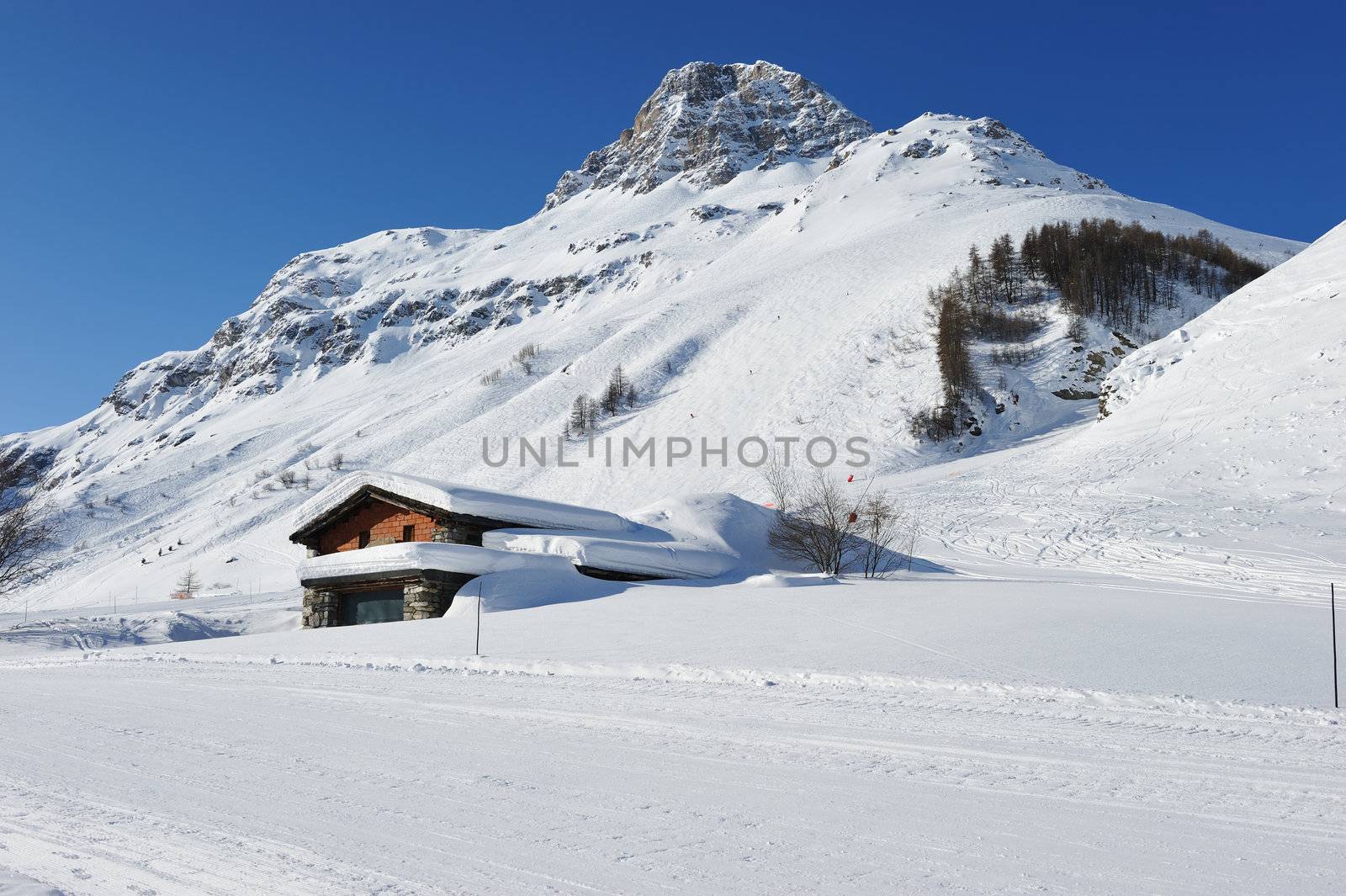 Mountain ski resort with snow in winter, Val-d'Isere, Alps, France