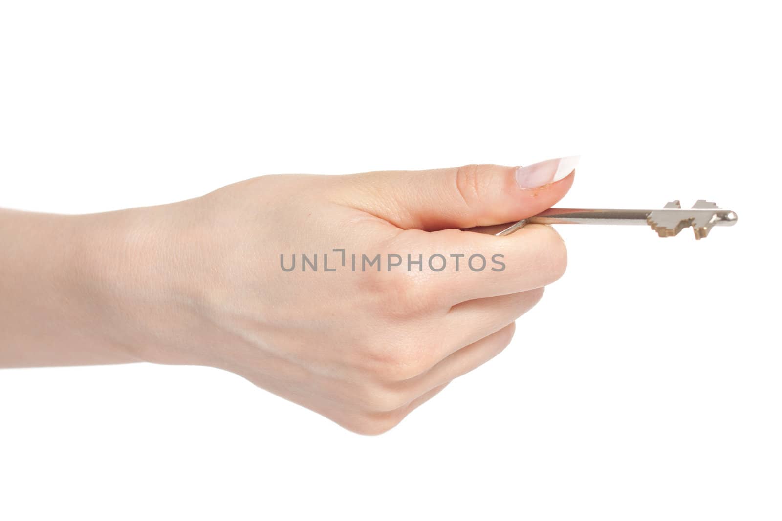 Woman hand holding key before opening door isolated on white background