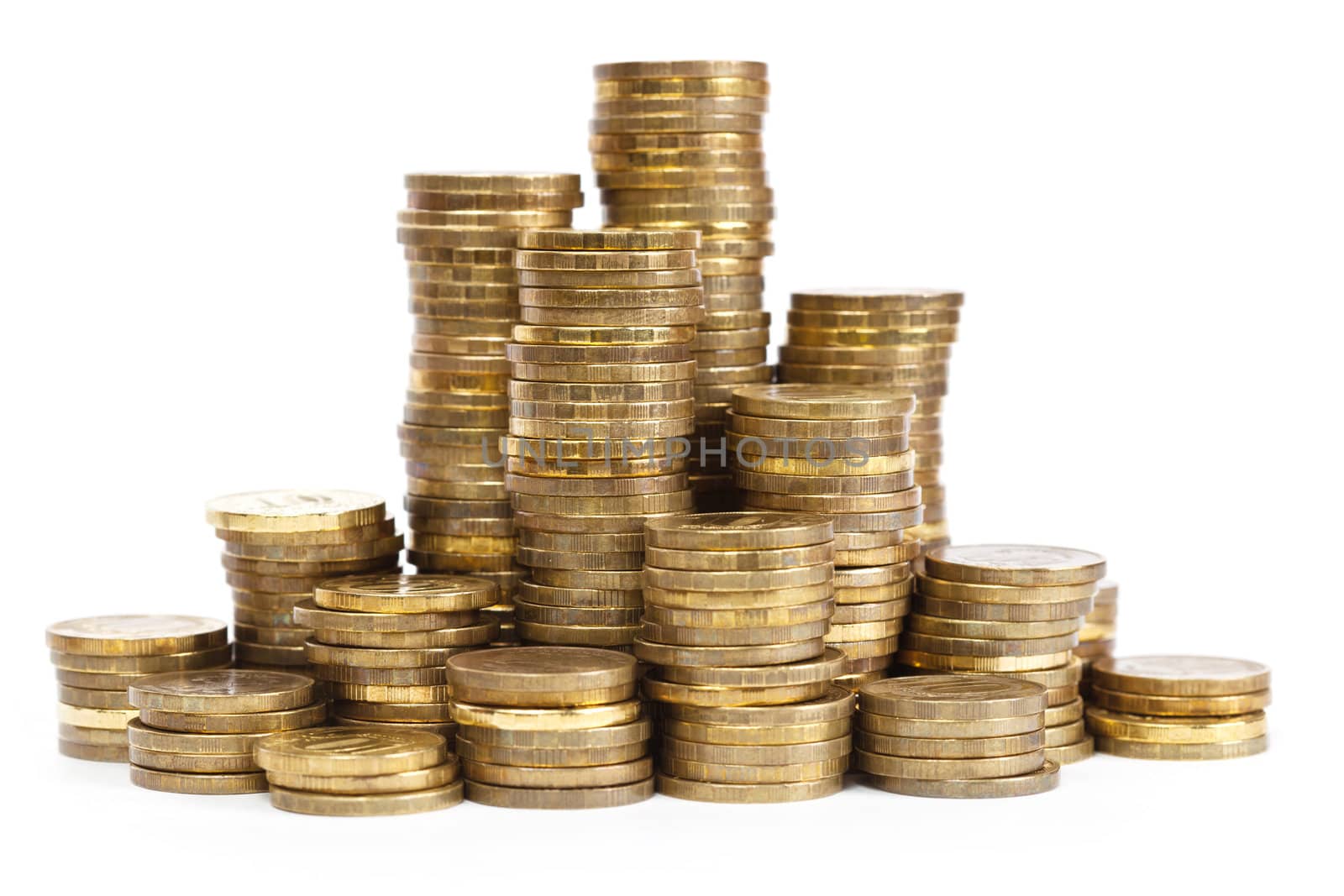 Towers of golden coins on white background
