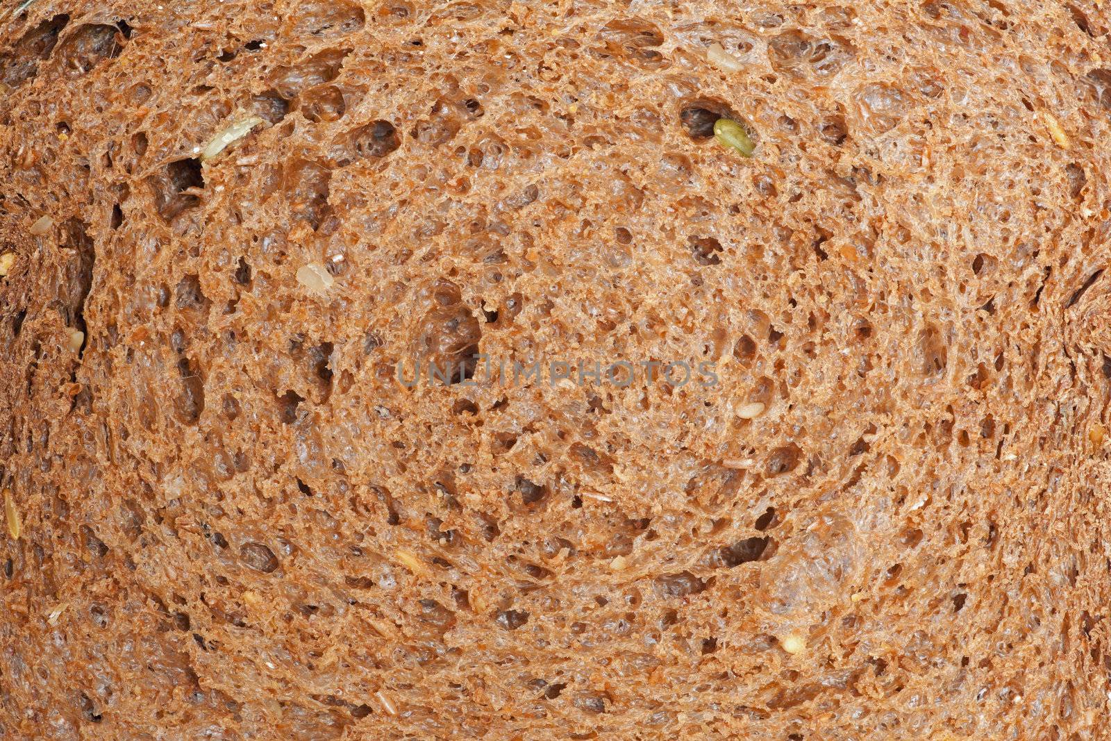 closeup of slice of brown whole wheat bread