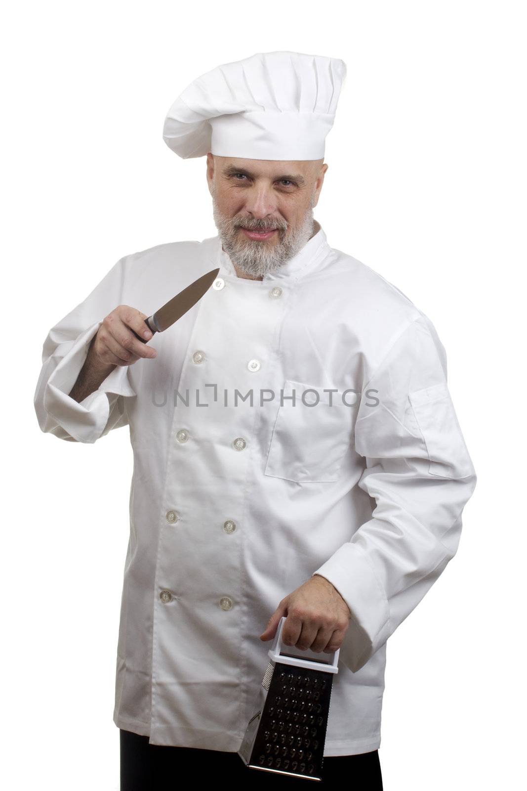 Portrait of a caucasian chef in his uniform on a white background.