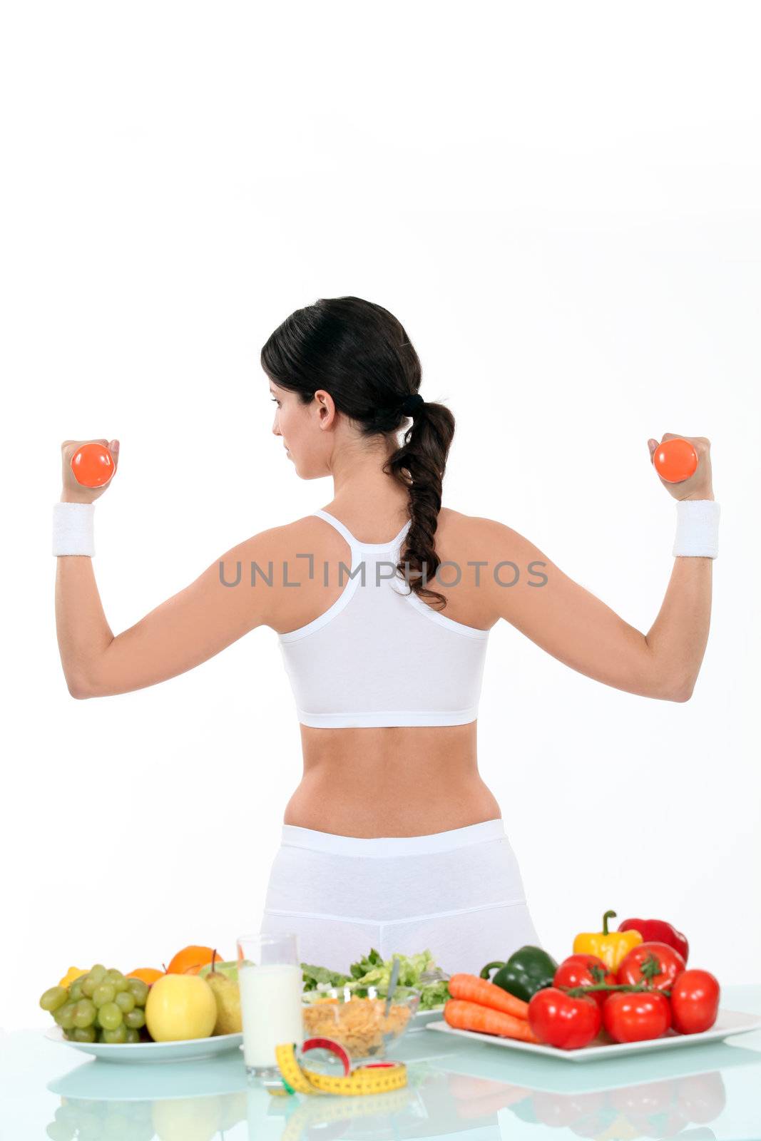 Woman living a healthy lifestyle by phovoir