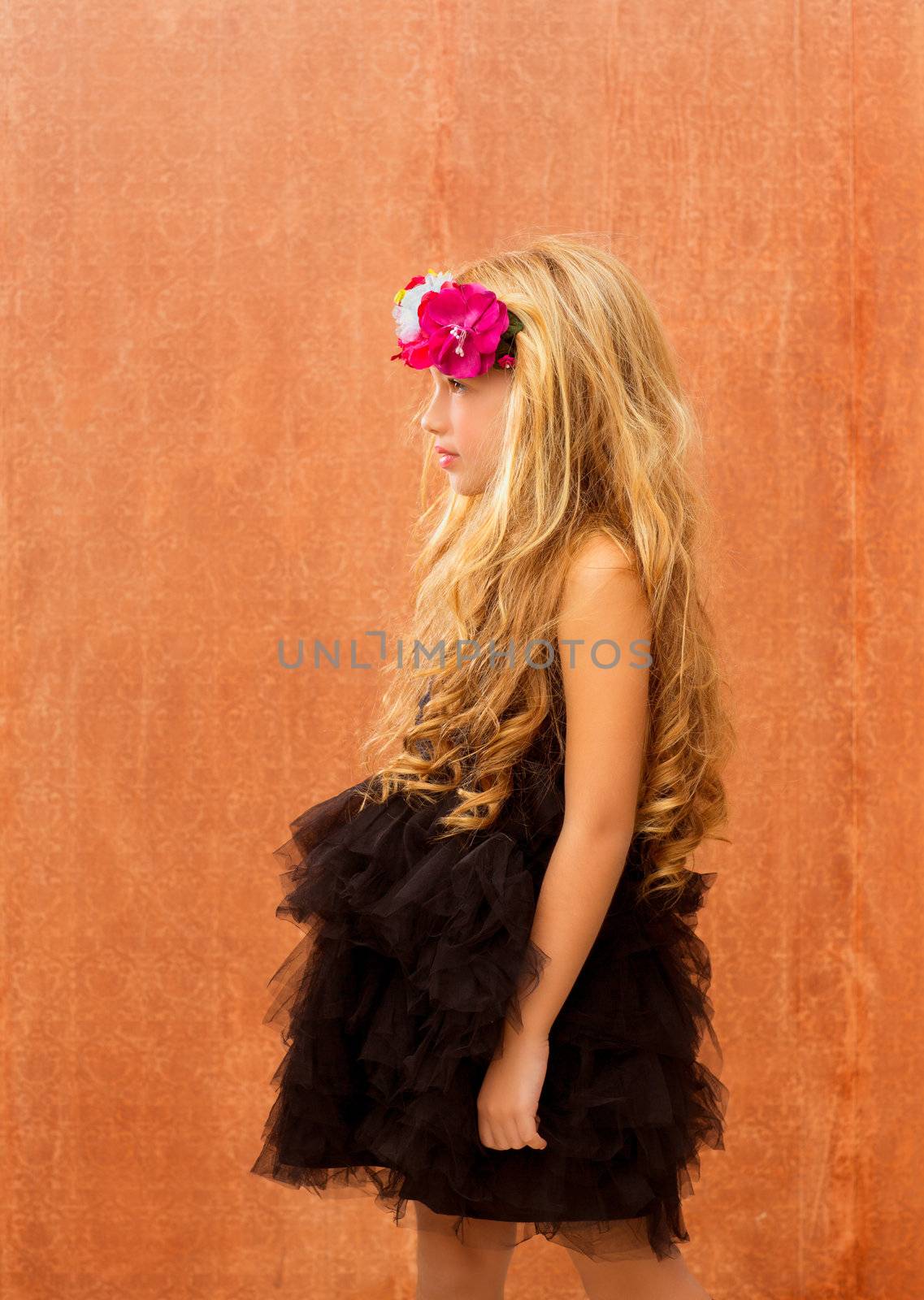 black dress kid fashion girl profile on retro vintage background