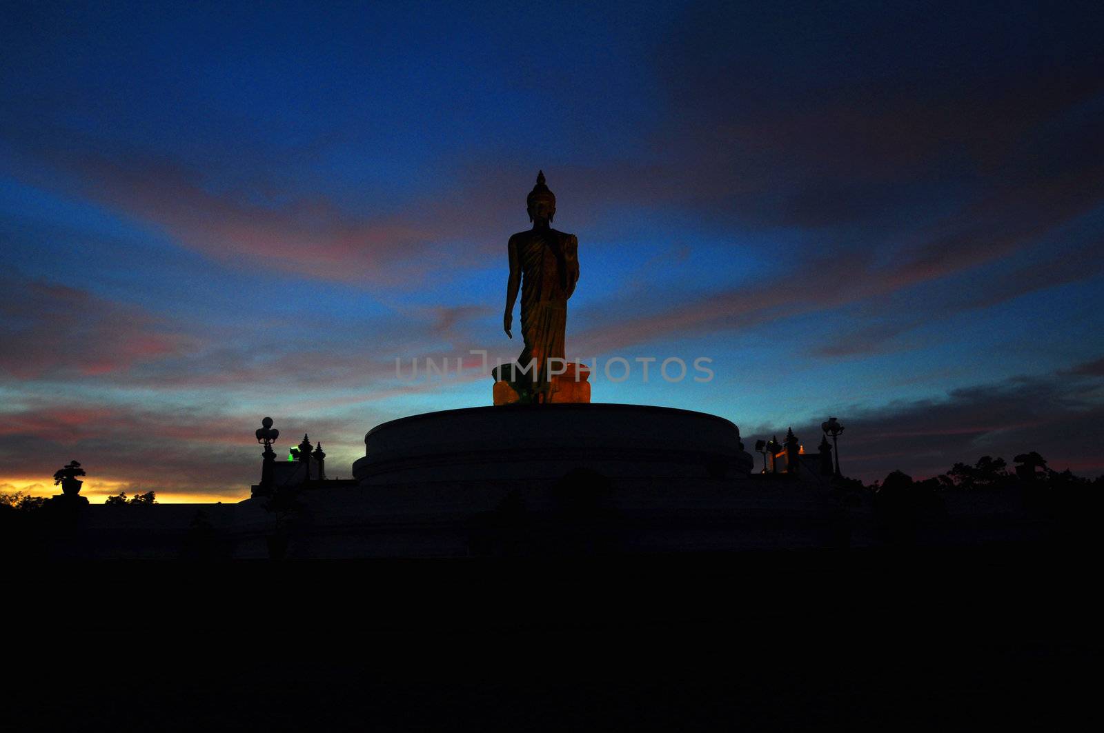 Buddha statue in night at Puttamontol temple, Thailand