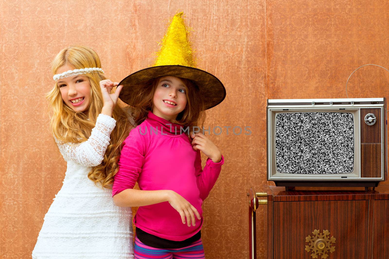 children 70s two kid friend girls in party with retro wood tv