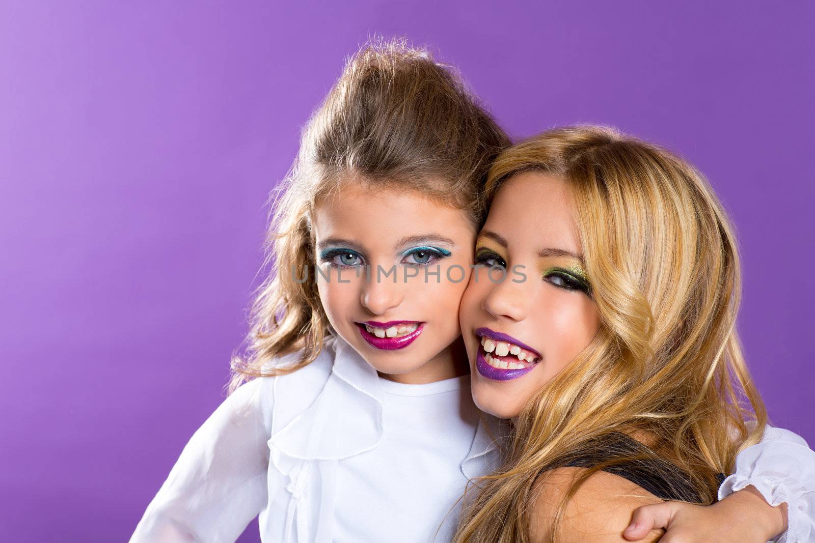 children two fashiondoll kid girls good friends with fashion makeup on purple