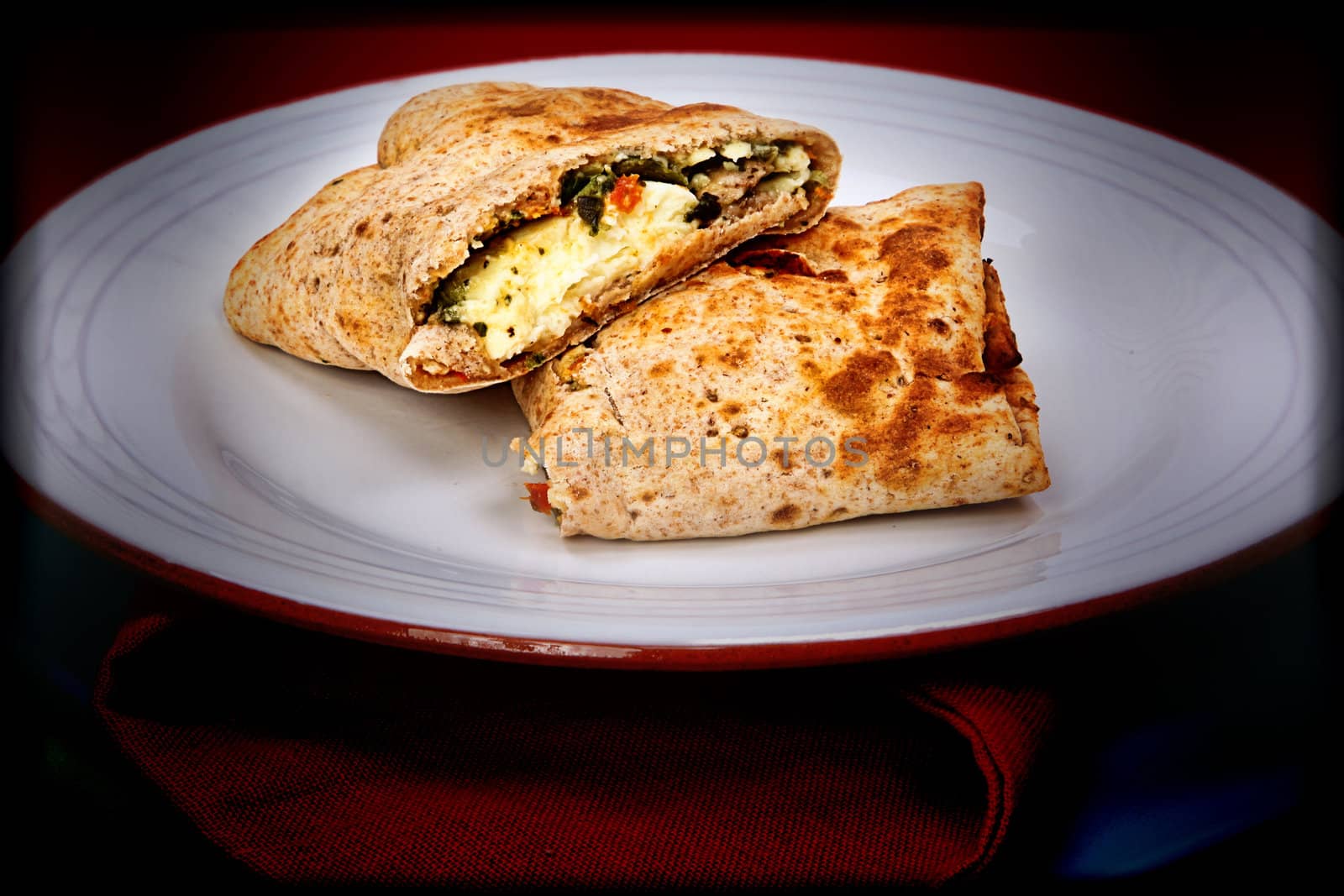 Late Night Feta Egg Wrap Snack on Plate and Napkins by duplass