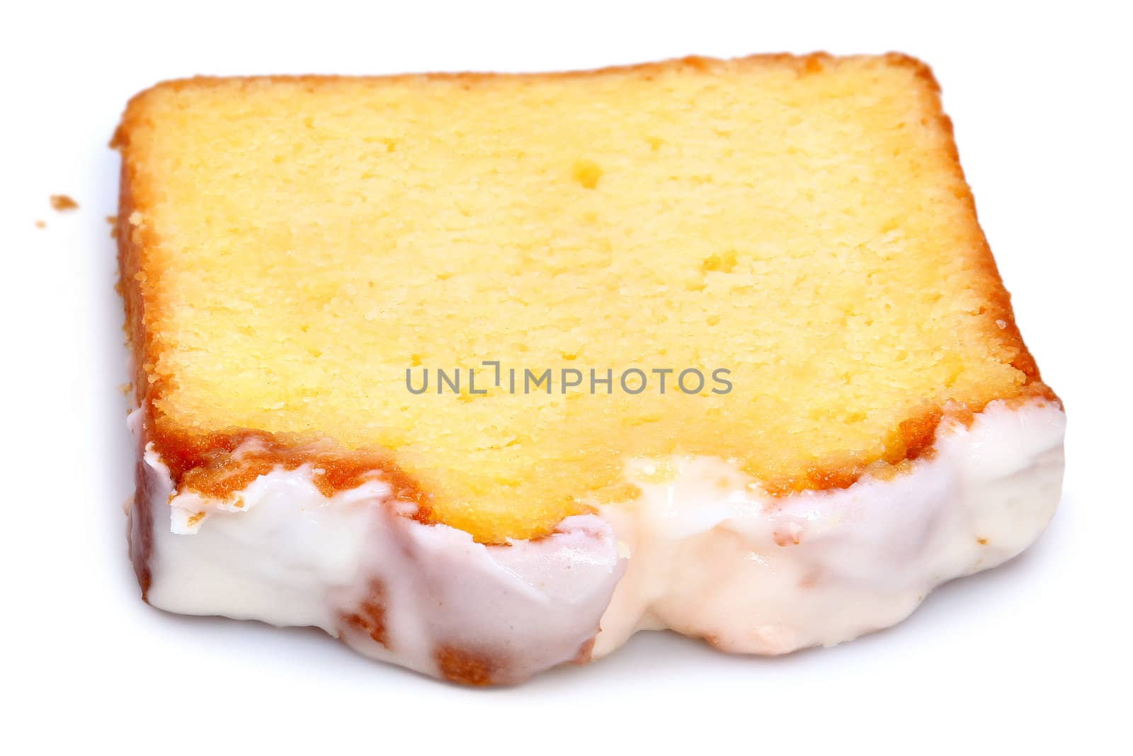 Single Slice of Iced Lemon Coffee Cake Over White