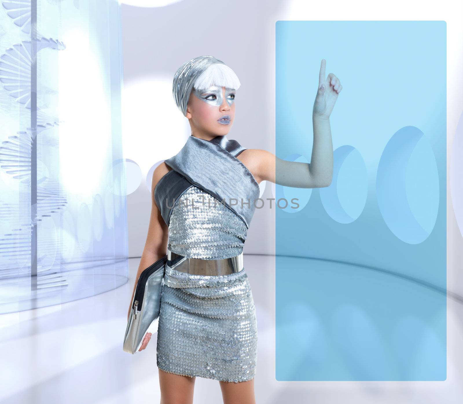 futuristic children girl in silver touch finger copyspace glass holographic screen