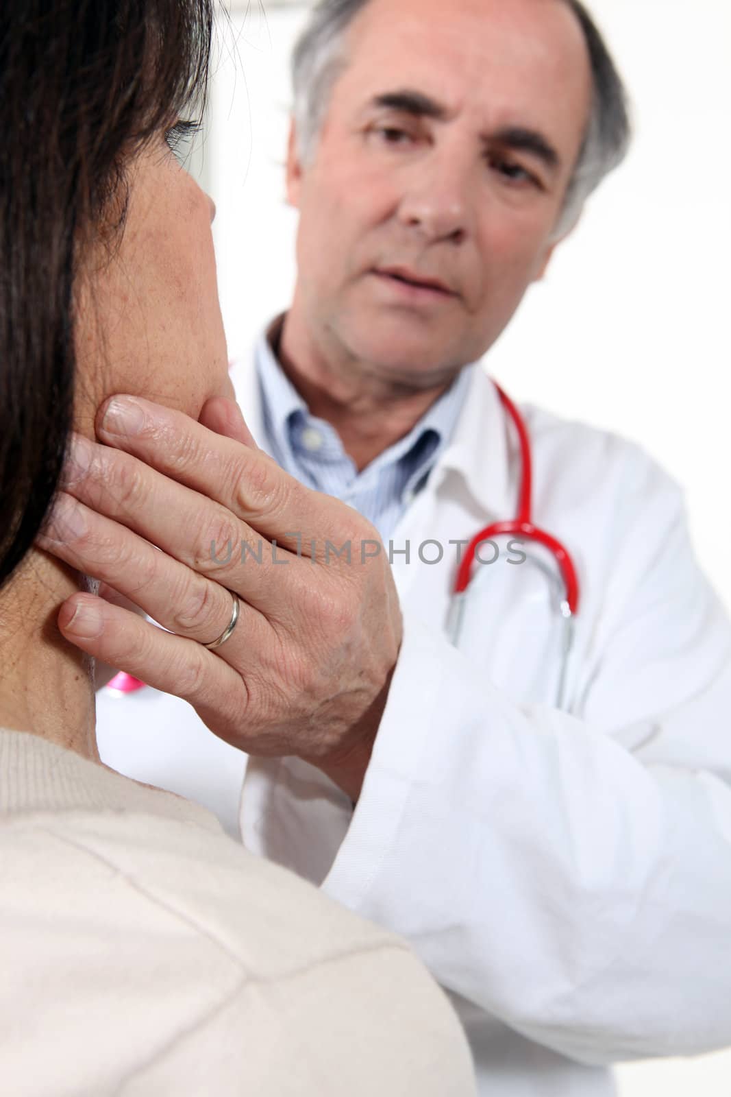 Doctor examining patient by phovoir