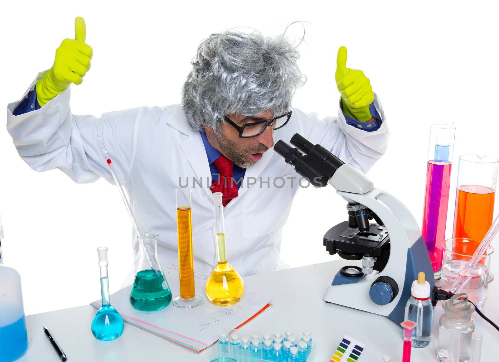 Crazy mad nerd scientist at laboratory microscope ok hand sign gesture