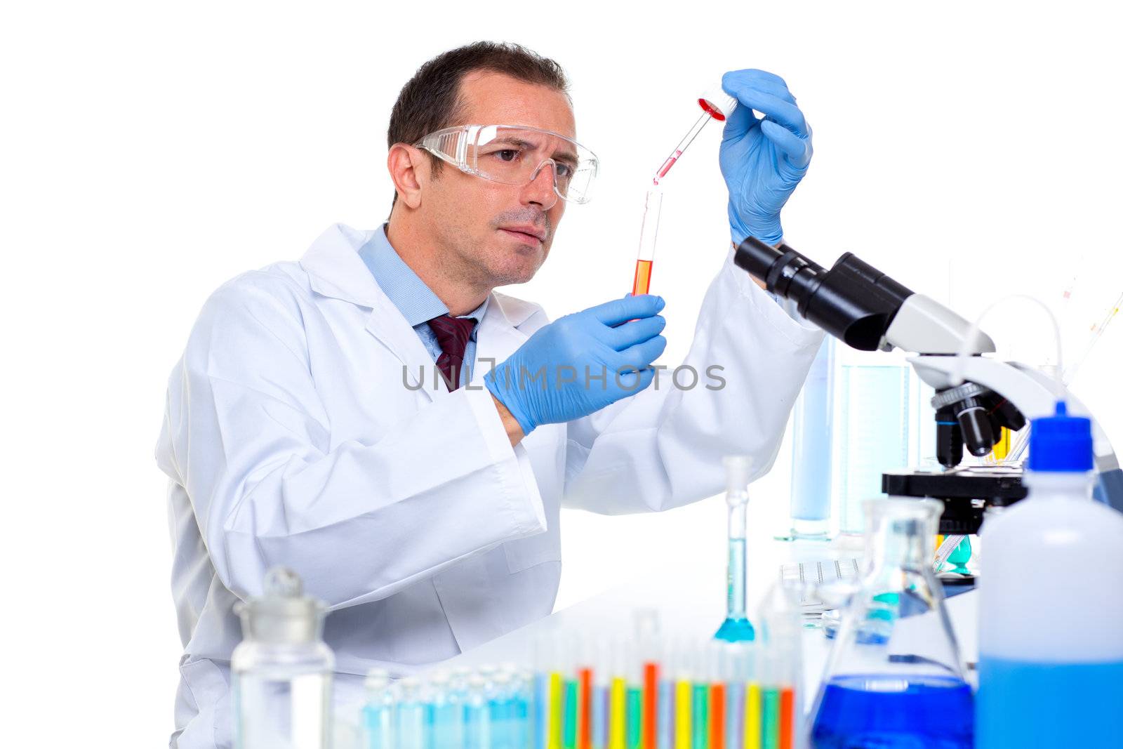 laboratory scientist working at lab with test tubes and microscope