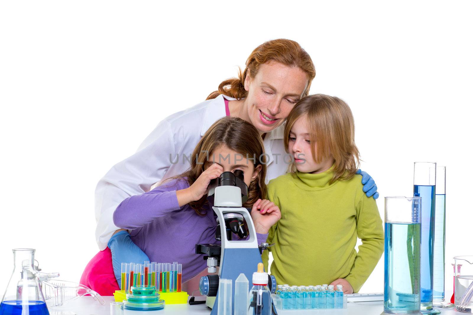 children girlas and teacher woman at school laboratory by lunamarina