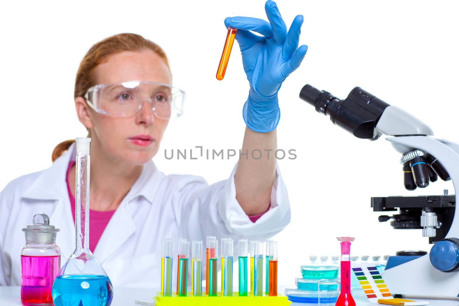 chemical laboratory scientist woman looking at test tube