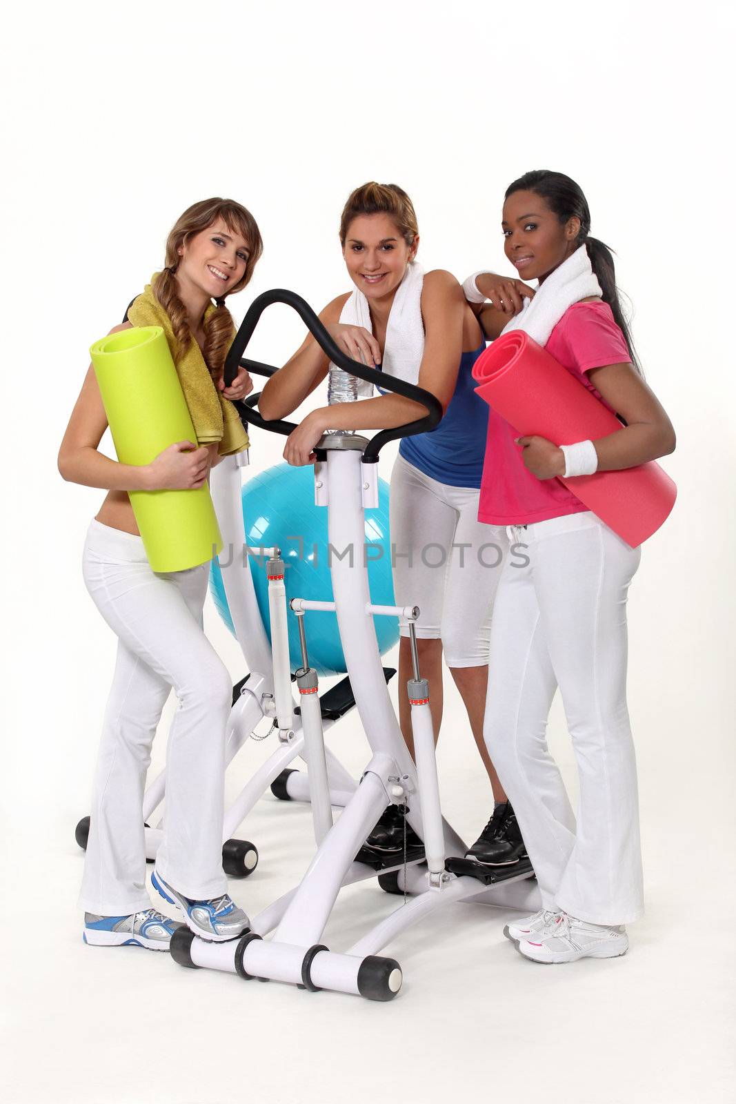 Girls with gym equipment by phovoir