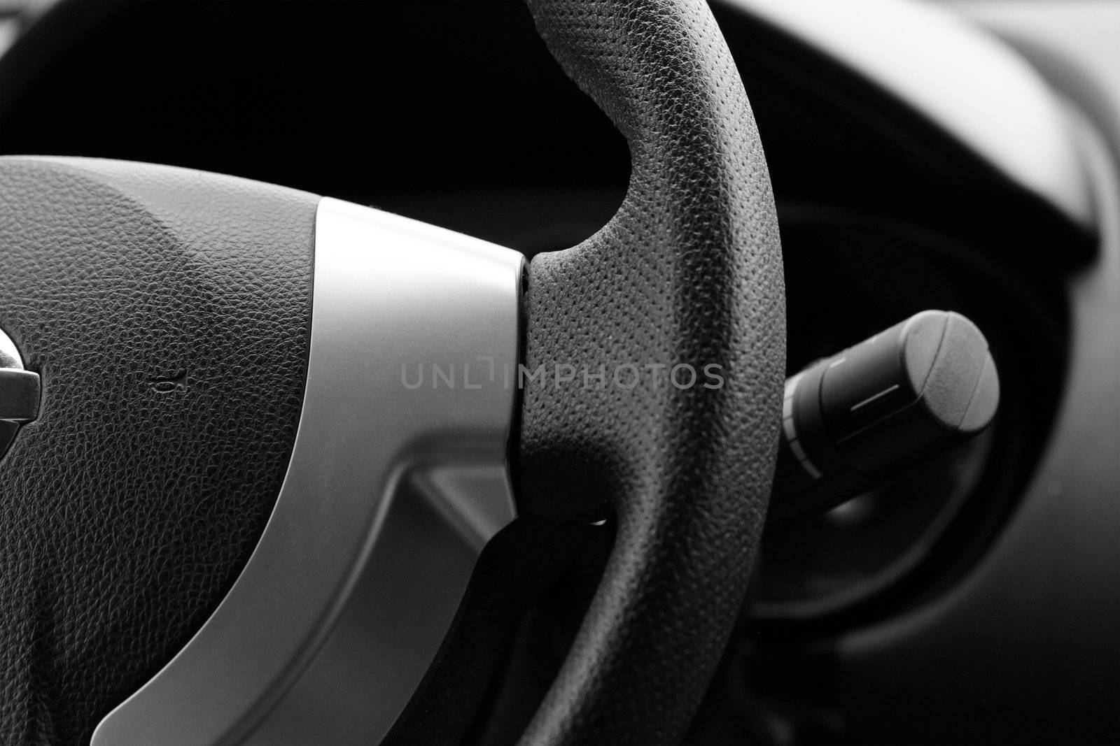 Steering wheel in interior of a new car