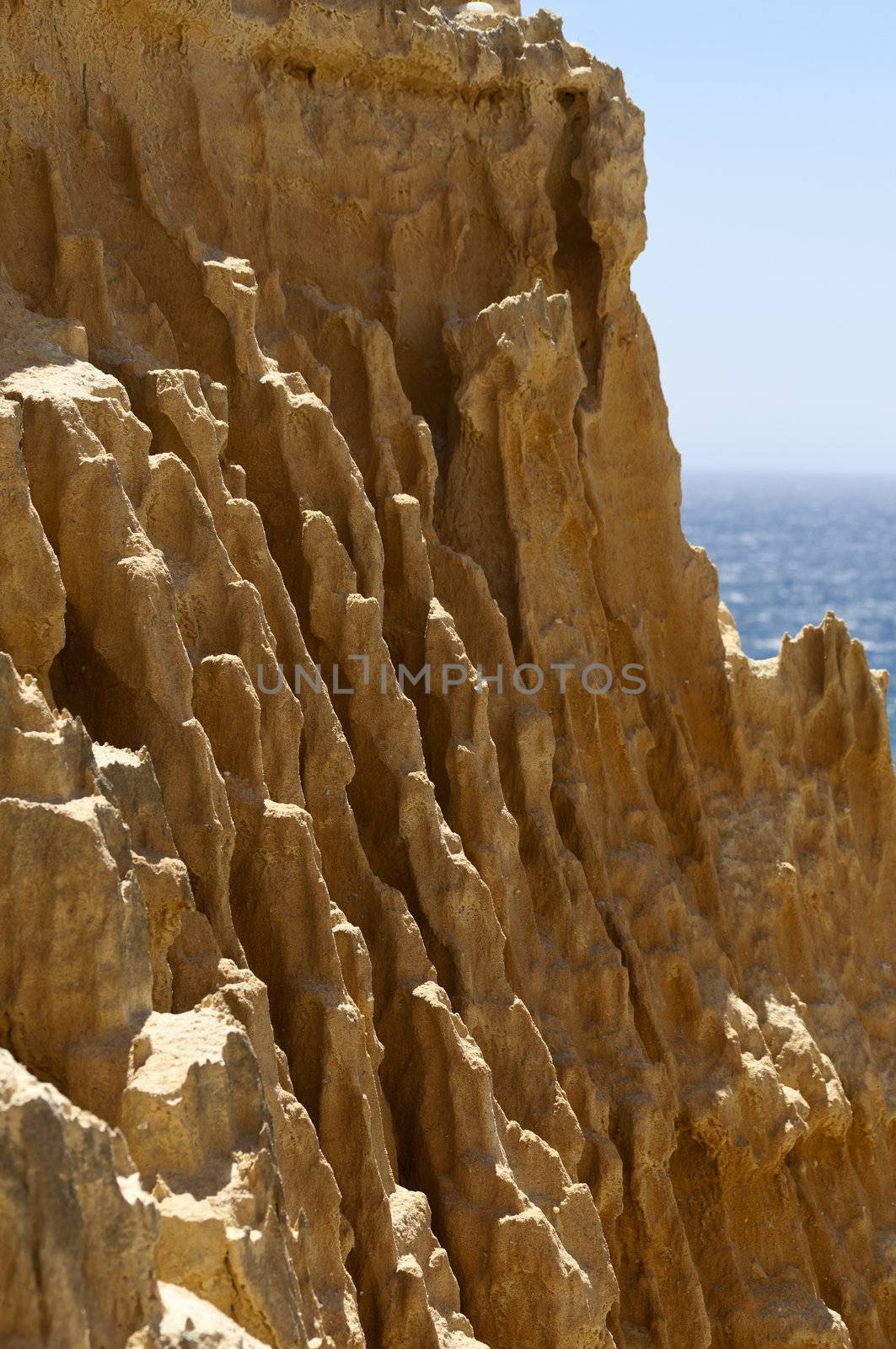 Sandstone cliffs detail in Gale beach, Comporta , Portugal