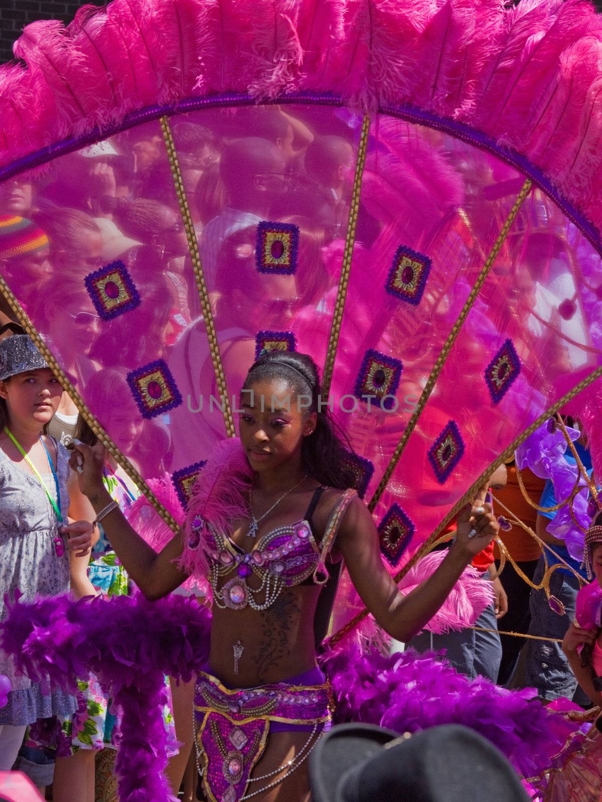 BRISTOL, ENGLAND - JULY 3: Participant in the St Pauls "Afrikan-Caribbean" carnival in Bristol, England on July 3, 2010. A record 70,000 people attended the 42nd running of the annual event