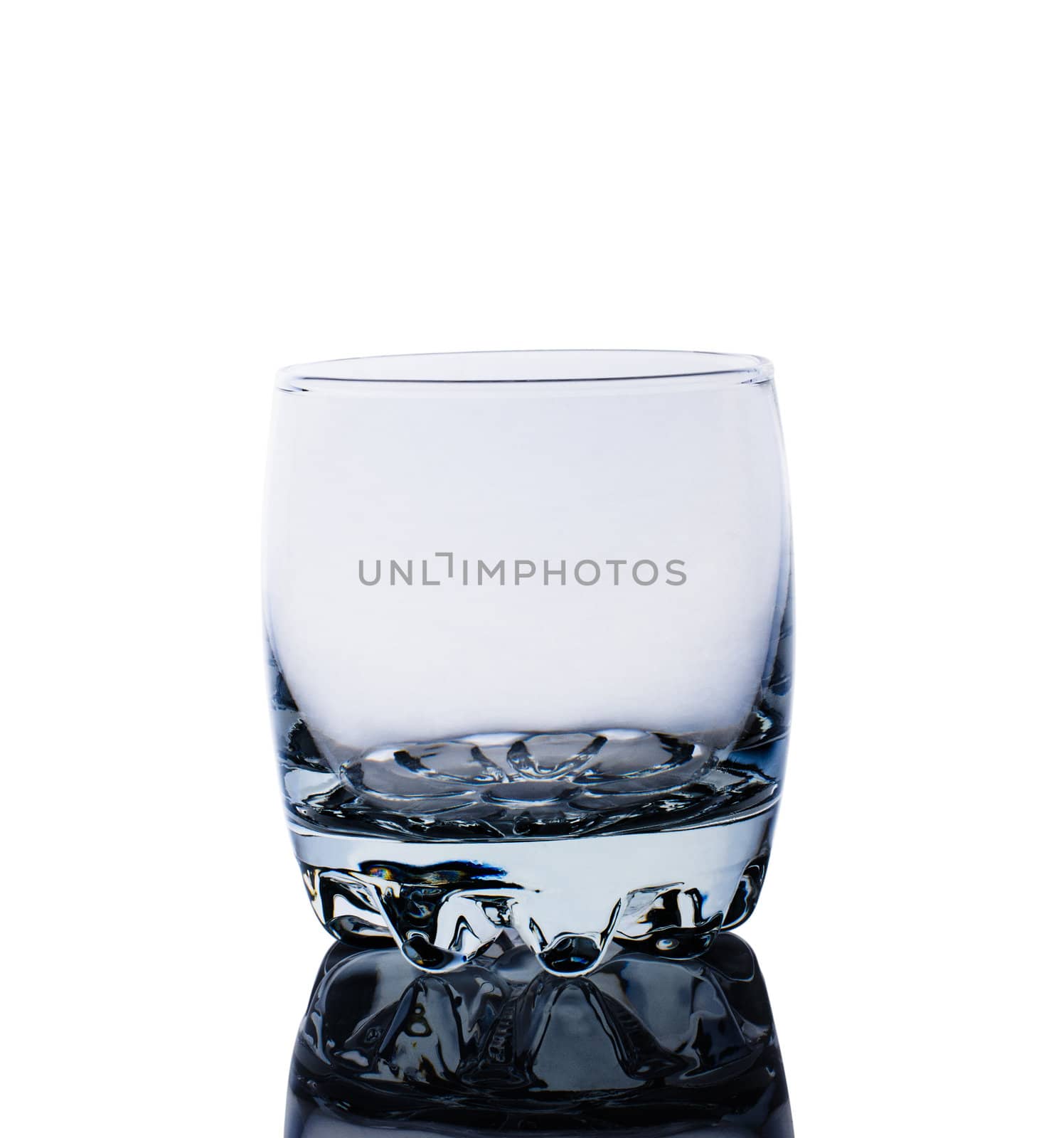 Empty glass for whiskey isolated on white background