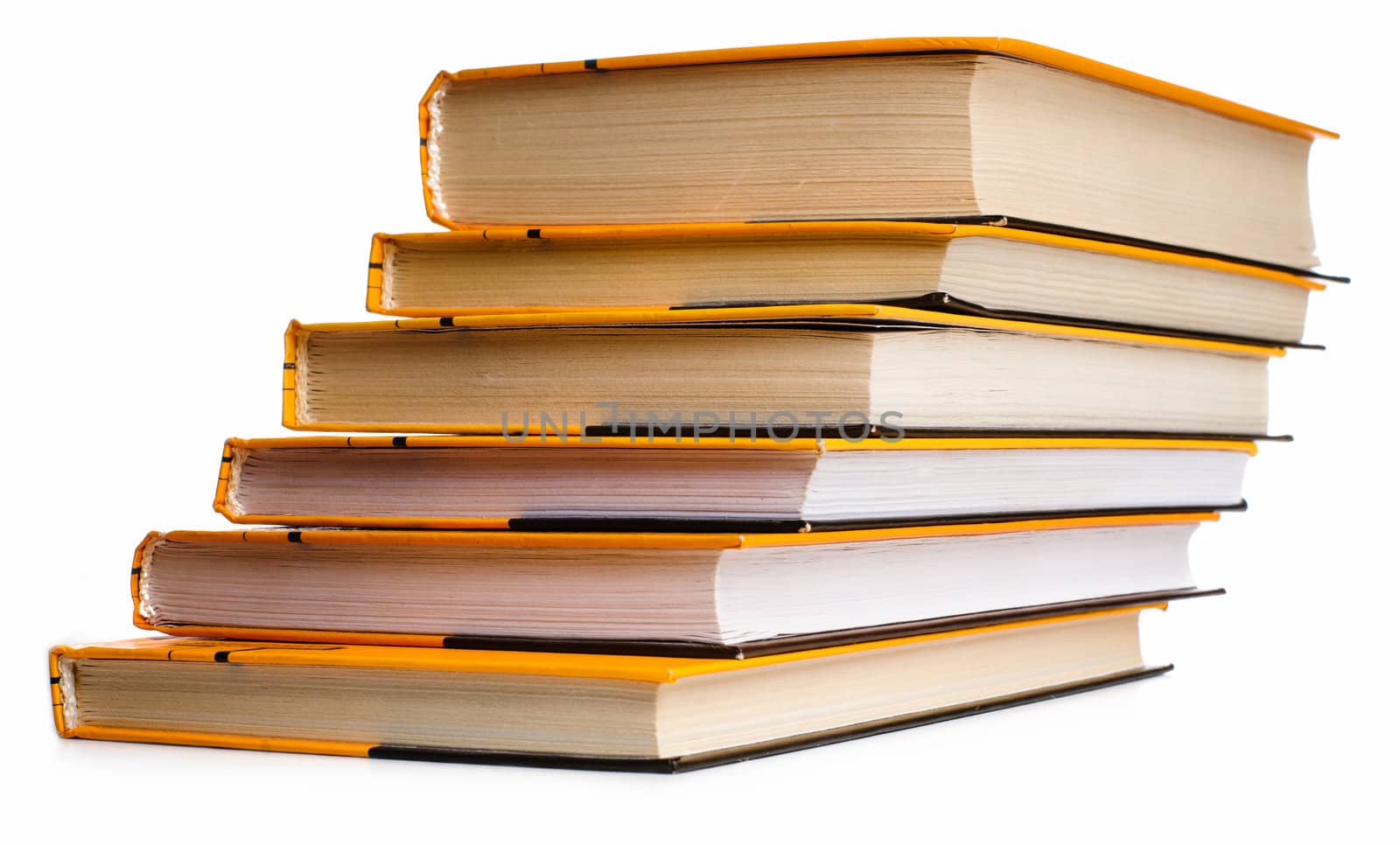 Big stack of yellow books isolated on white background