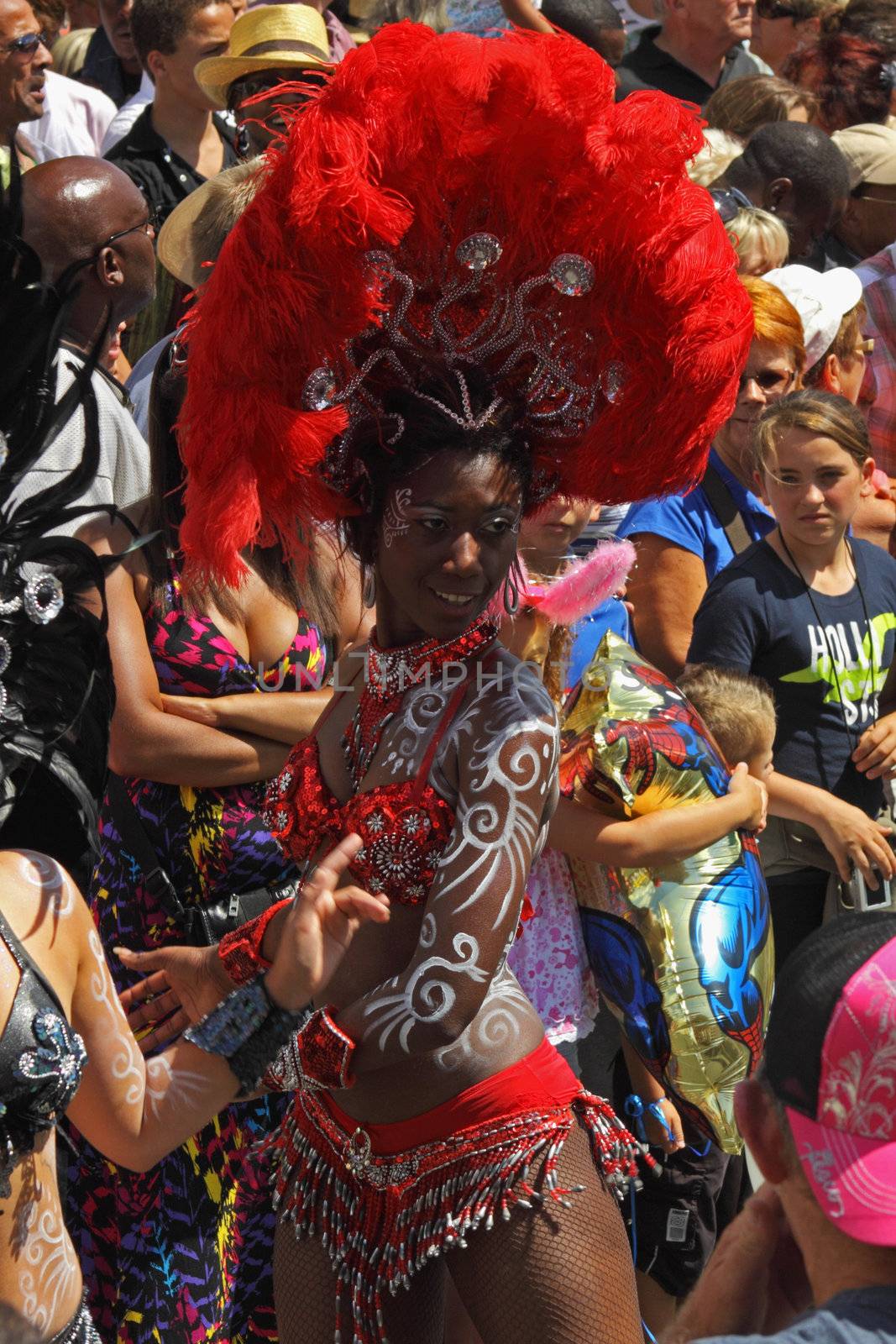 BRISTOL, ENGLAND - JULY 3: Participant in the St Pauls "Afrikan-Caribbean" carnival in Bristol, England on July 3, 2010. A record 70,000 people attended the 42nd running of the annual event