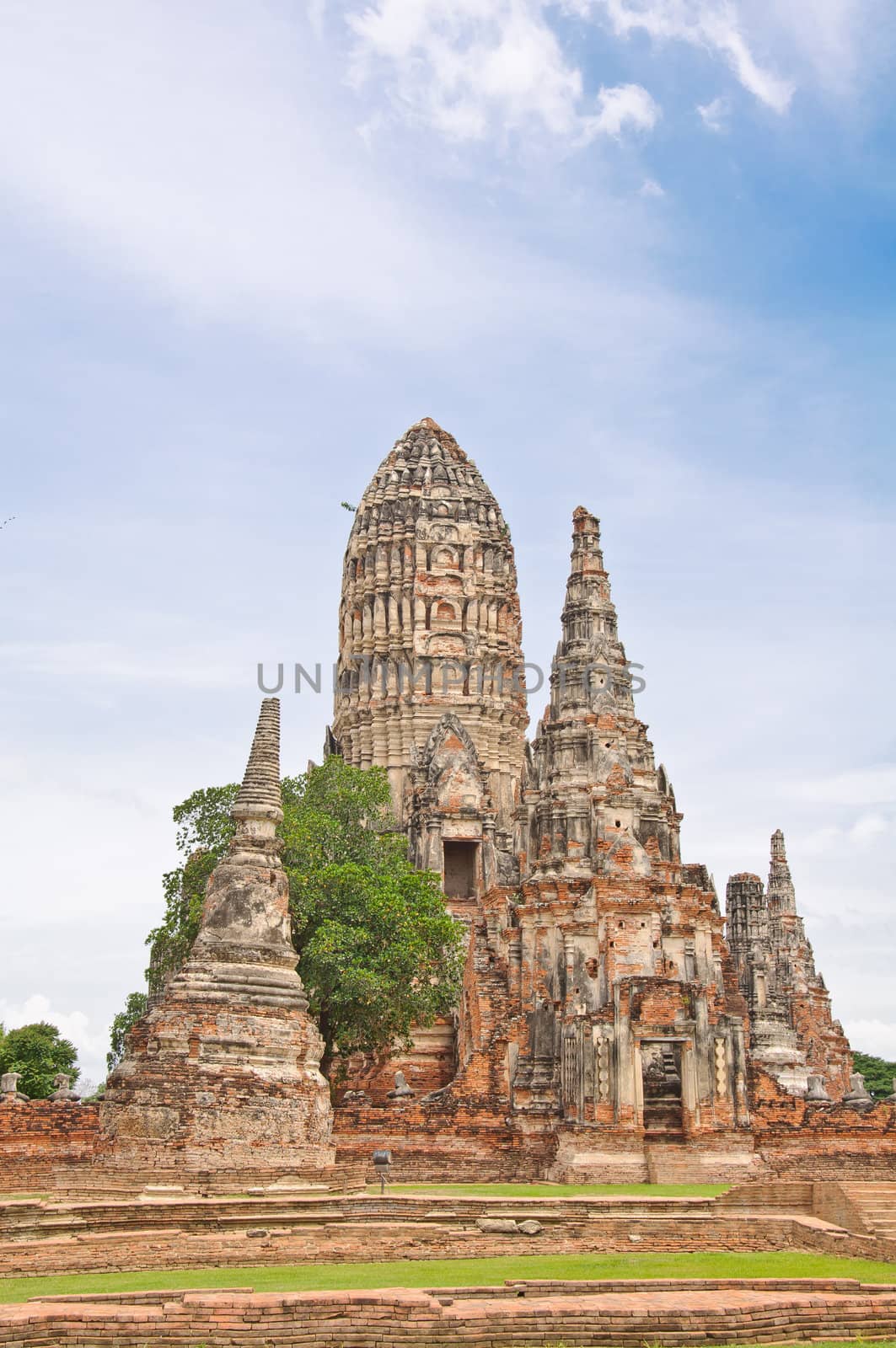 Ancient pagoda in ruined old temple at Chai Wat Tha Na Ram temple, Ayutthaya, Thailand.