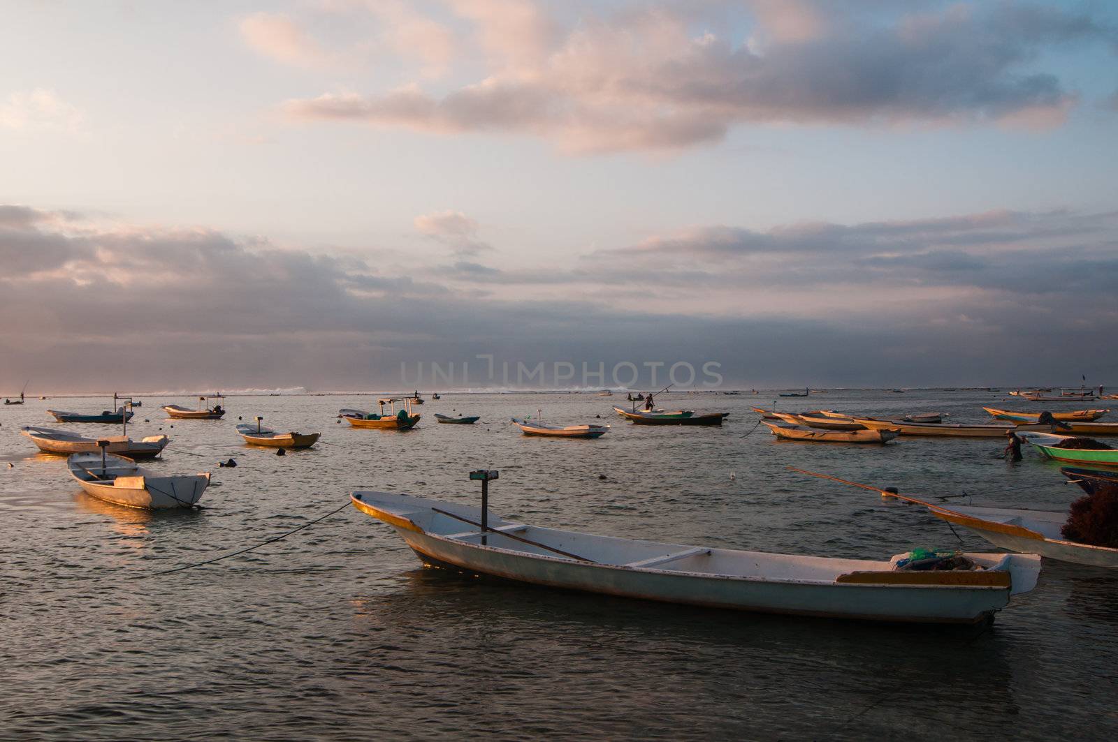 Sunset with boats by nvelichko