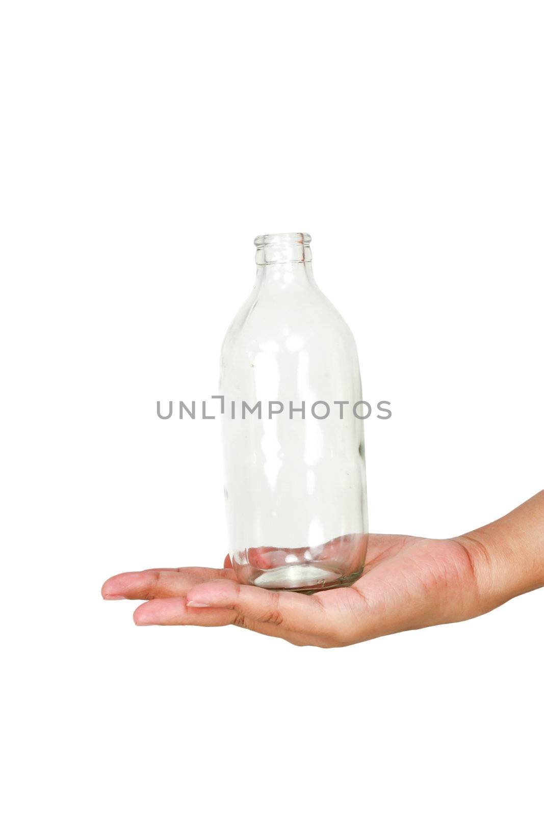 Glass bottle on hand.