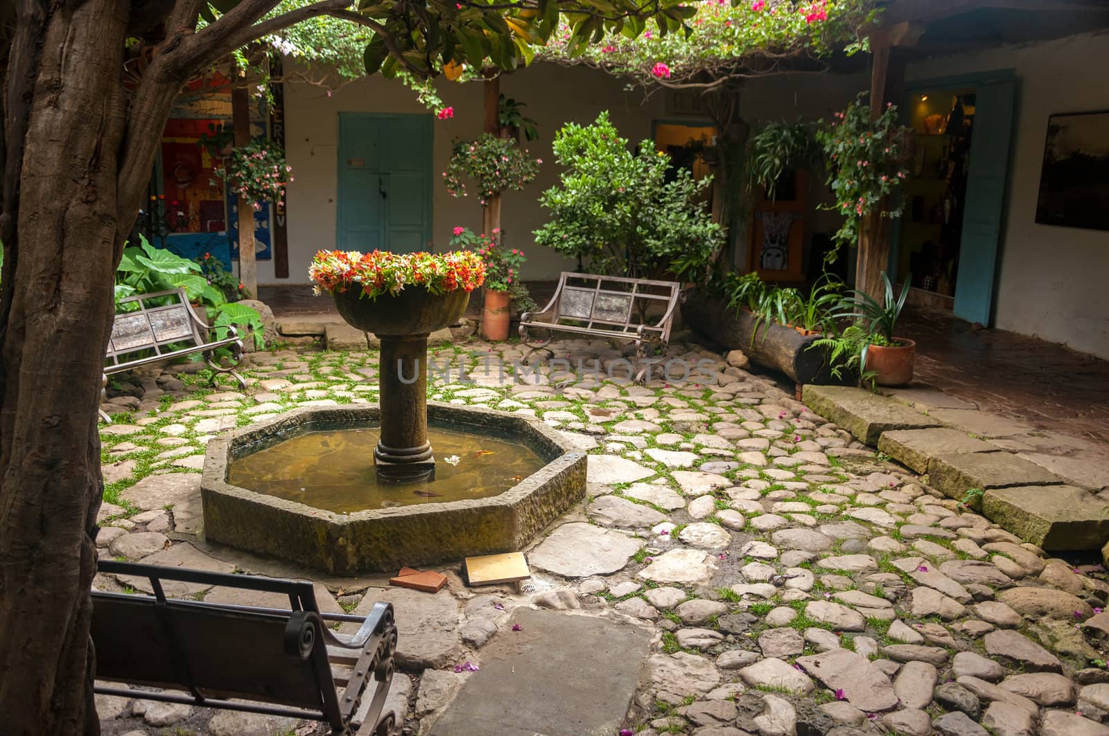 Beautiful old fountain in a colonial courtyard in Villa de Leyva, Colombia