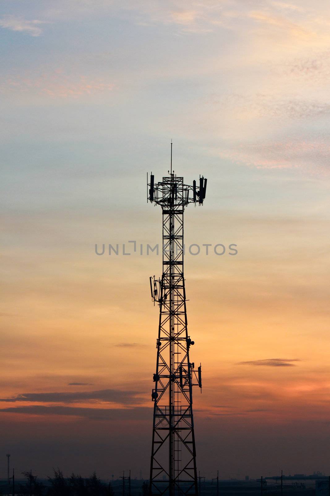 Modern cell and antenna with flat parabola on Sunset. by bajita111122