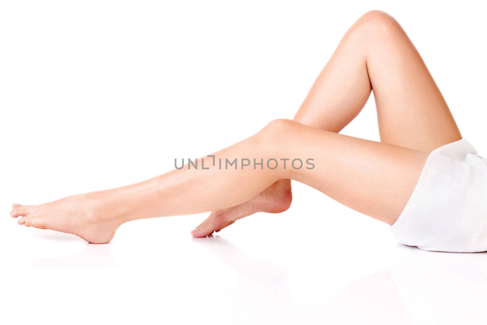 legs of young woman, isolate on white background. Health concept