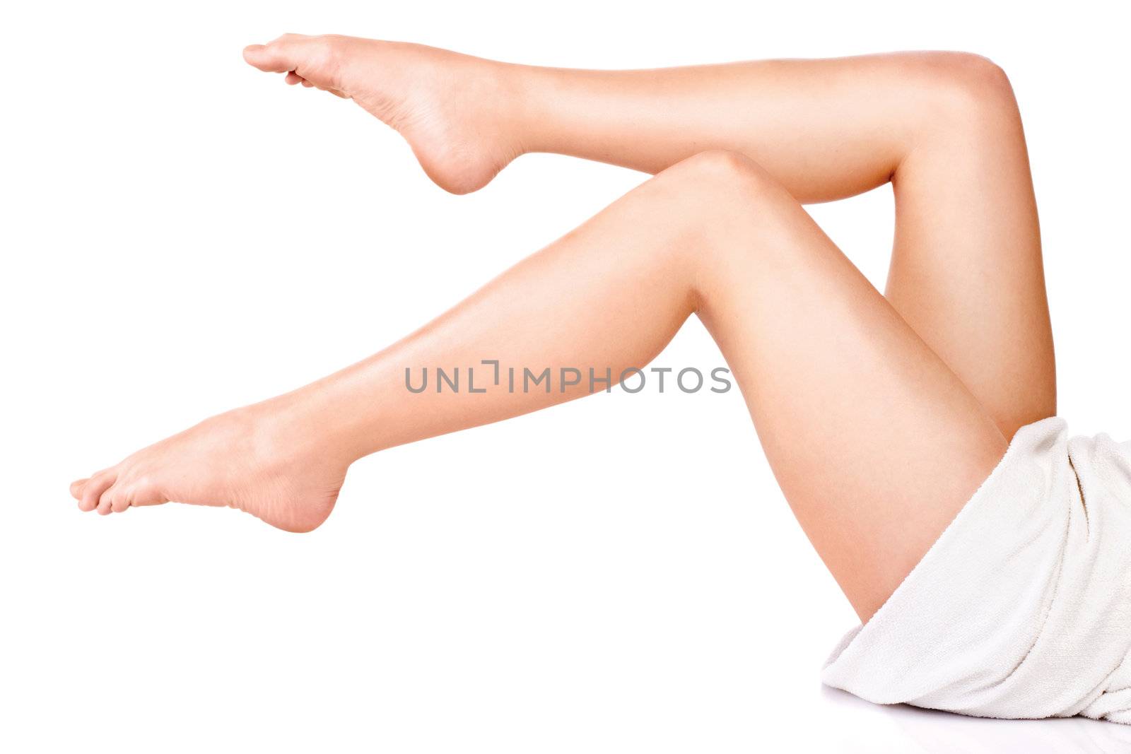 legs of young woman, isolate on white background. Health concept