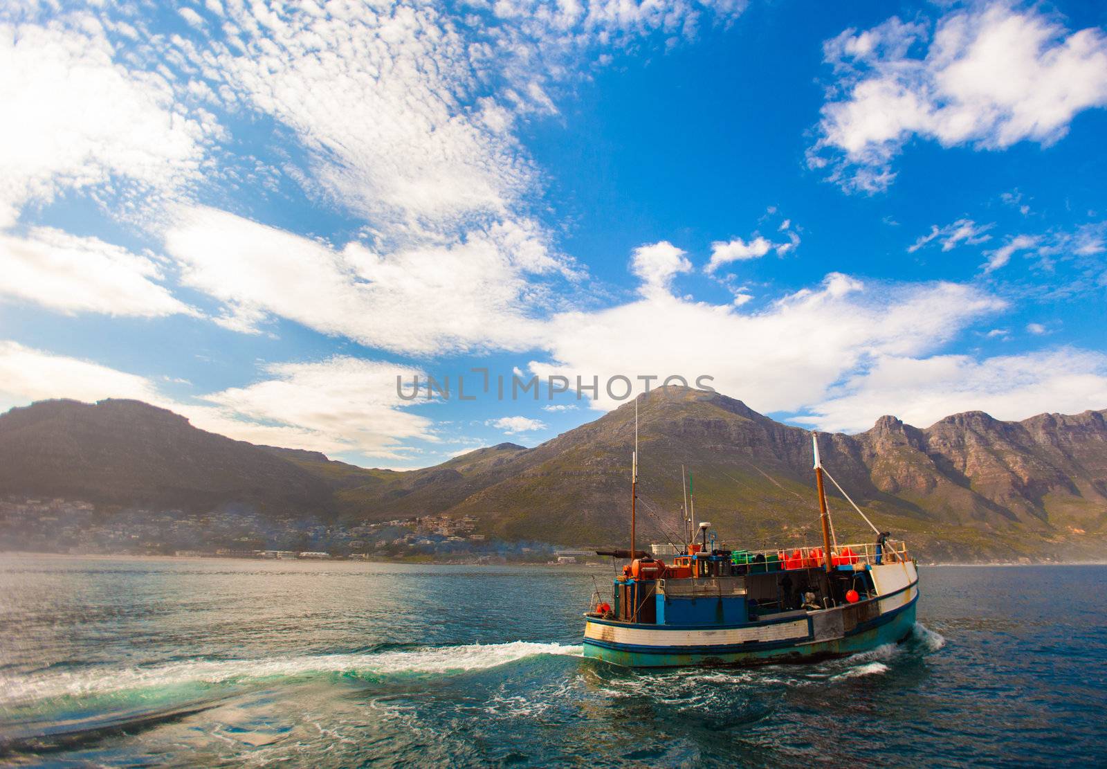 Fishing boat steaming out of Hout Bay