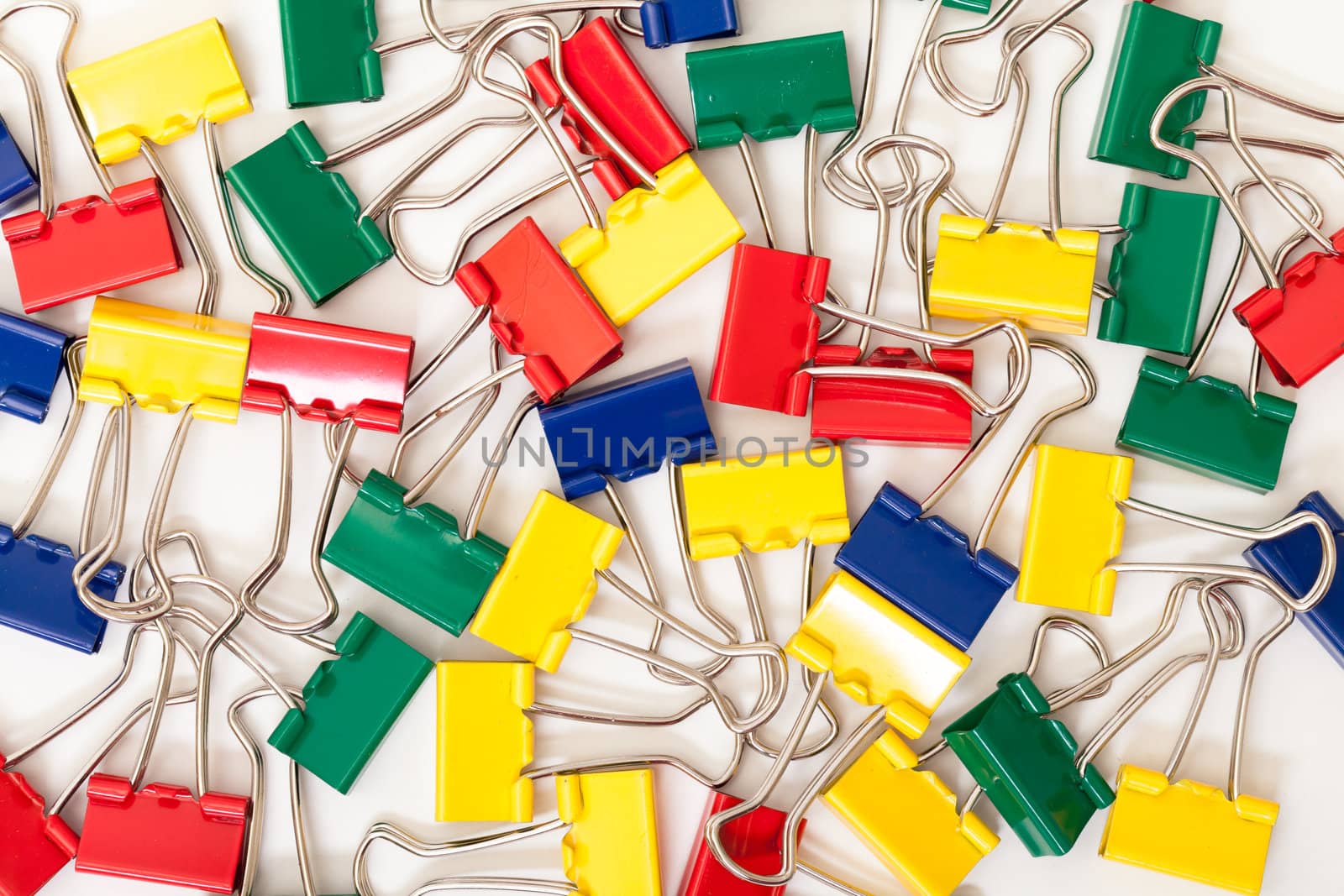 background of Multicolored Paper Clips, on white 