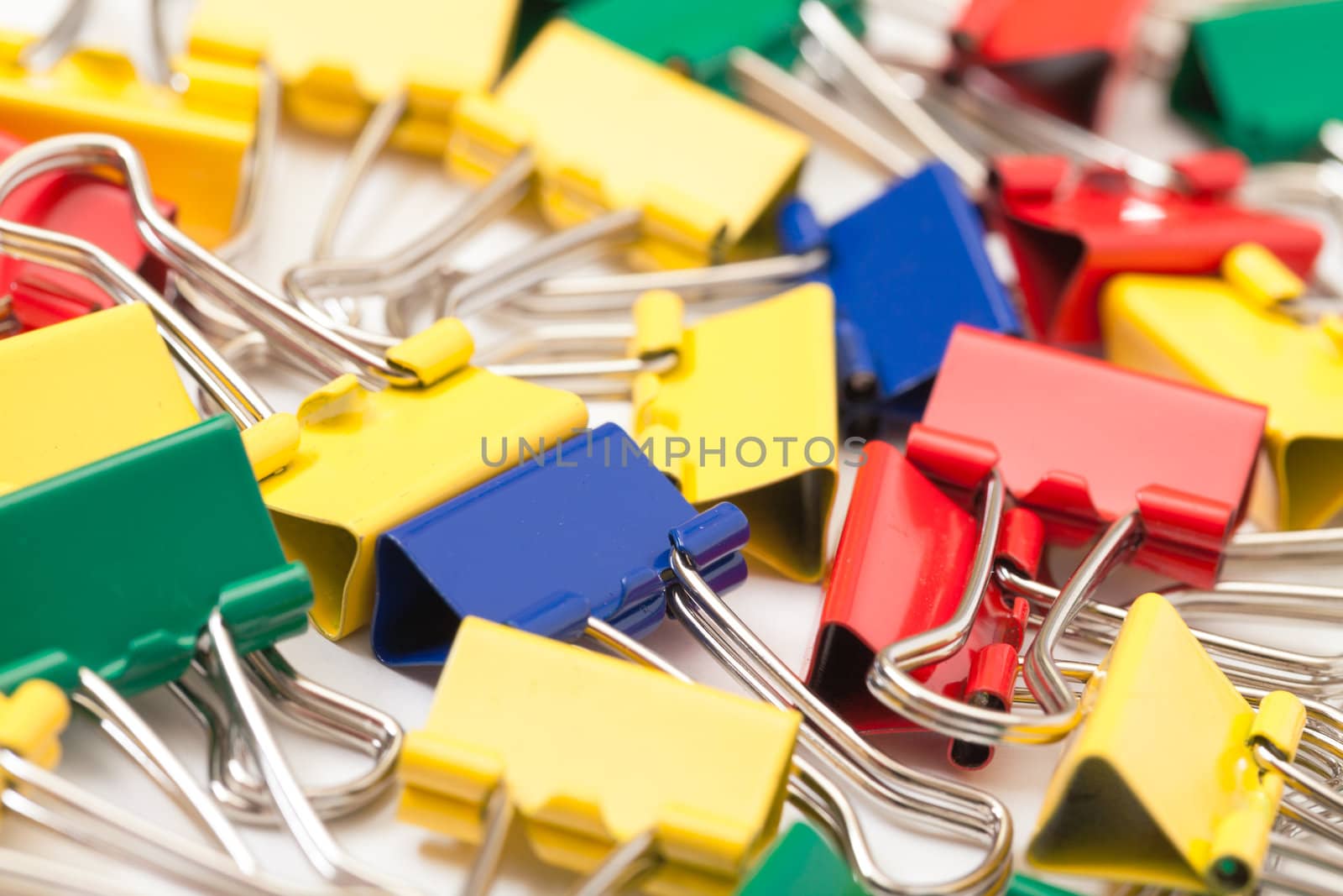 Multicolored Paper Clips, closeup on white background