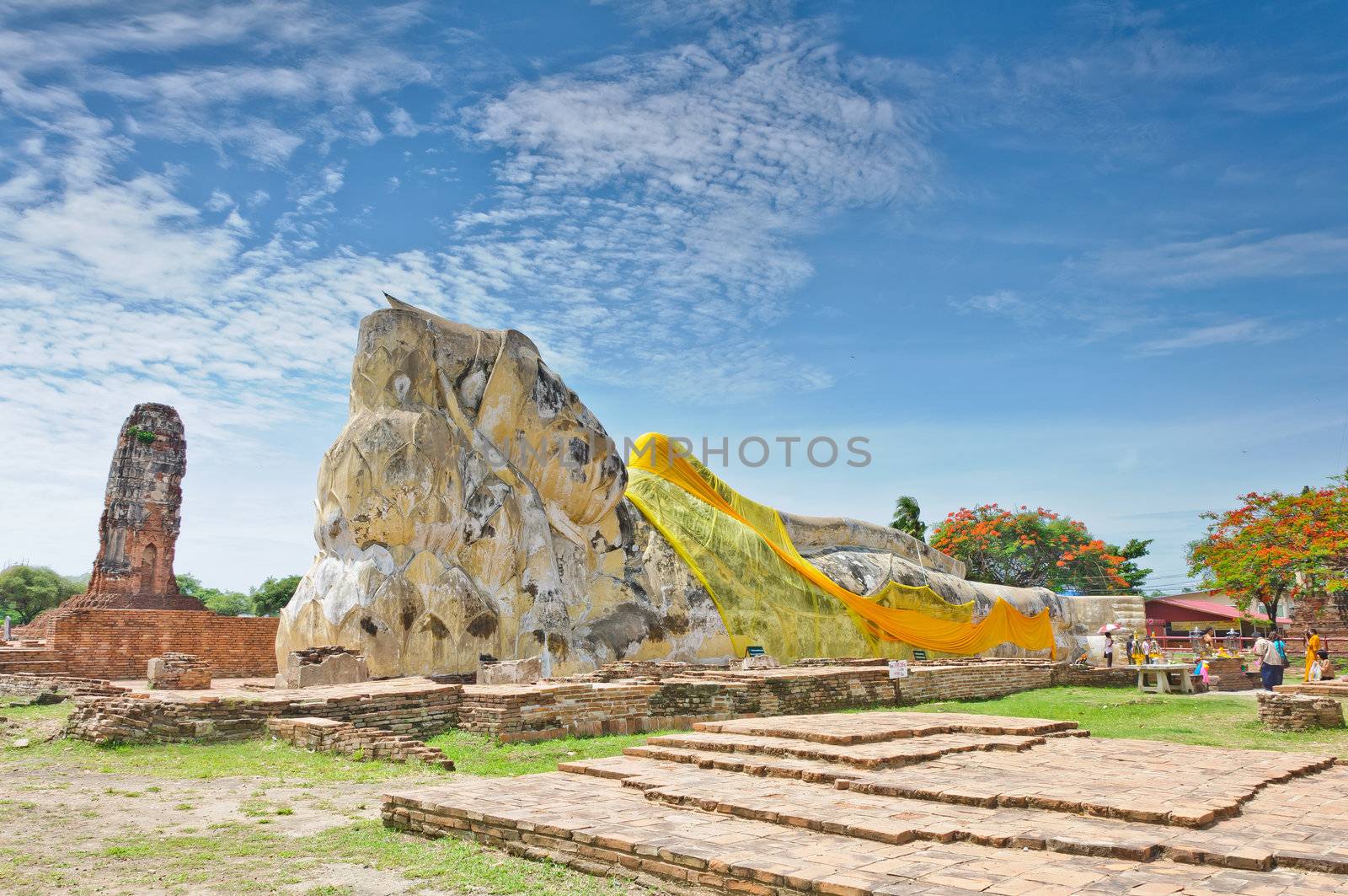 Ancient sleeping buddha statue at Wat Lo Ka Ya Su Tha temple in Ayutthaya, Thailand