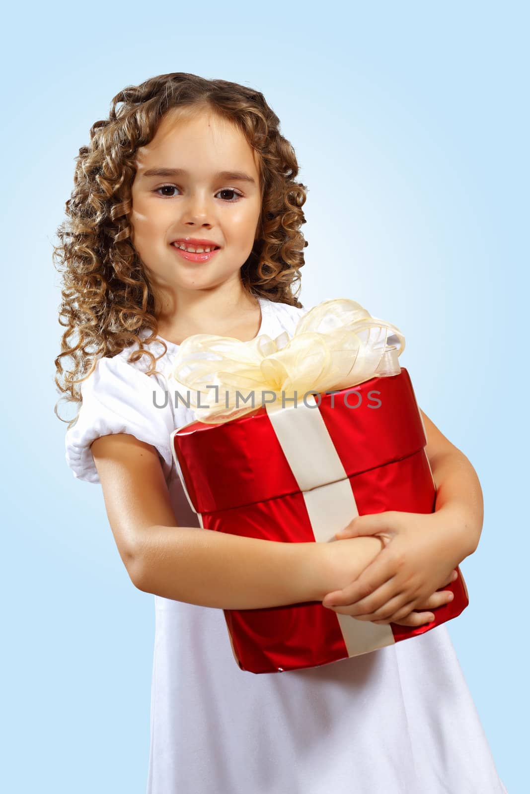 Portrait of an adorable preschool age girl wearing a Christmas holiday outfit