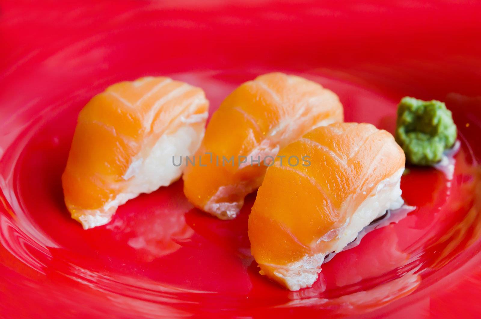 salmon sushi , japanese style cuisine .