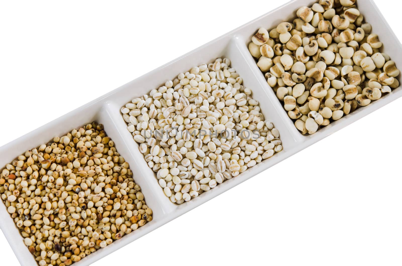  job's tears , barley and millet grains on white bowl
