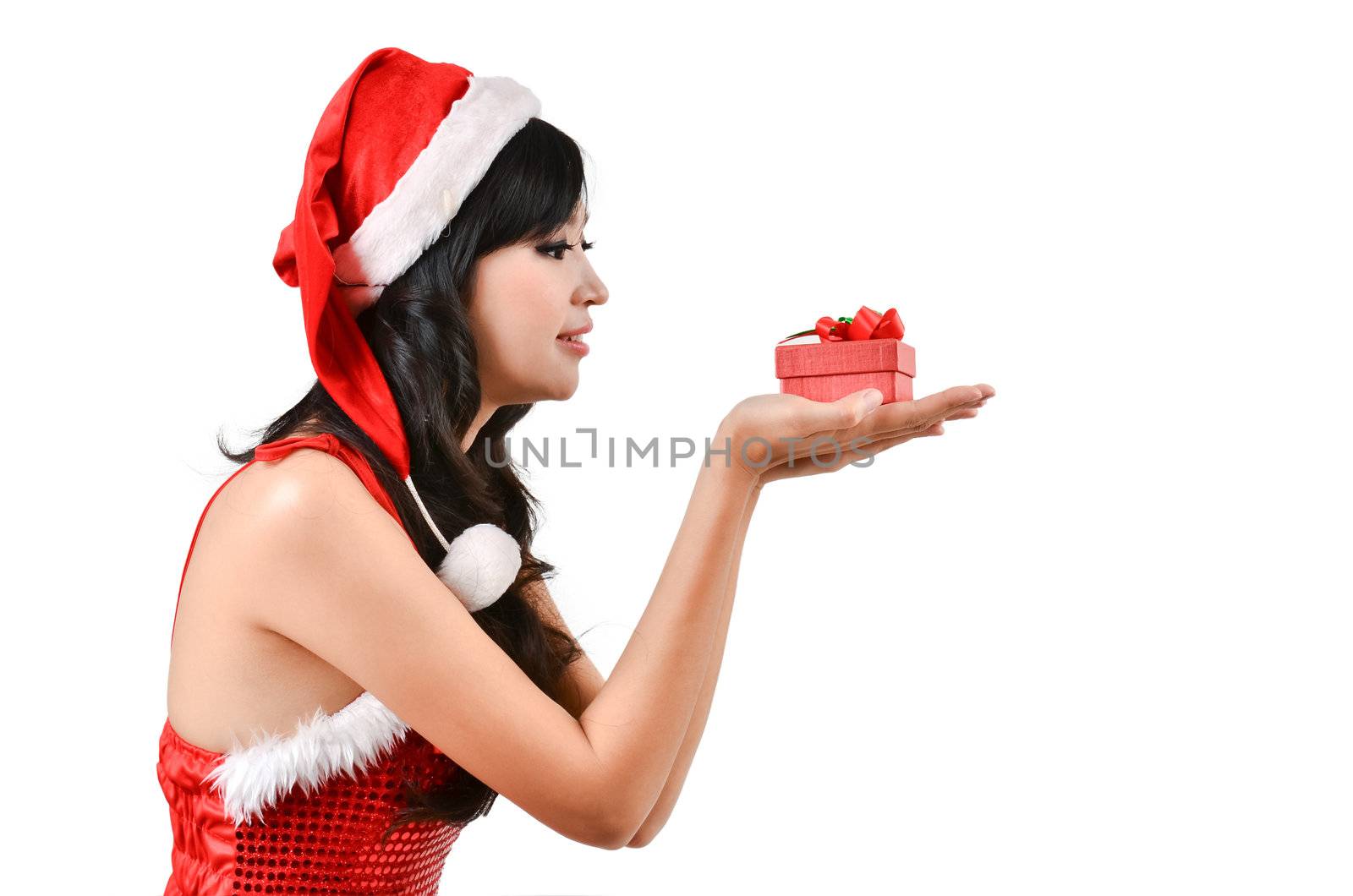 Santa woman  holding a gift box by anankkml