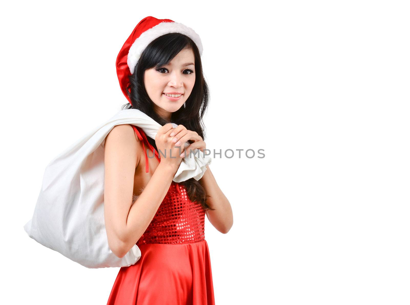 Santa woman  holding a white bagisolated a on white background